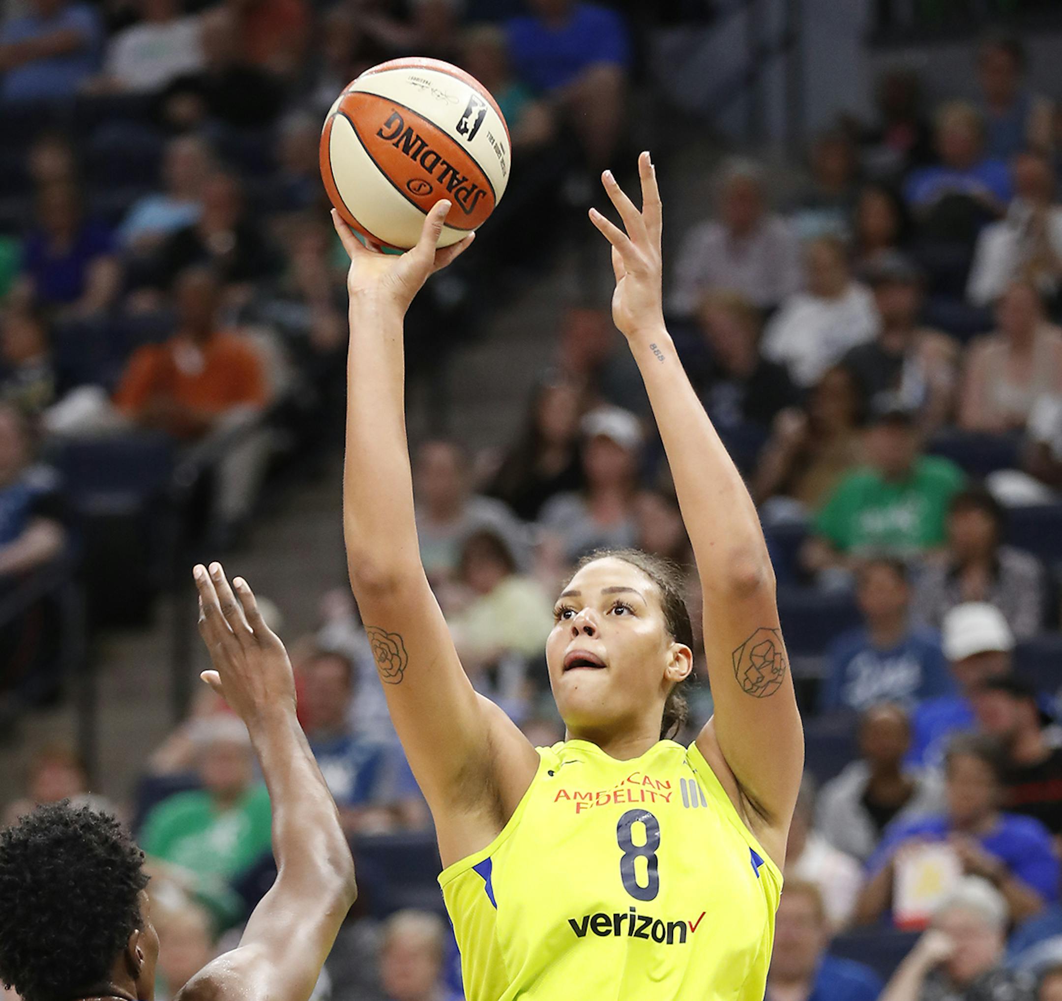 Dallas Wings center Elizabeth Cambage (8) shoots as Minnesota Lynx center Sylvia Fowles (34) defends during the second half. ] LEILA NAVIDI ï leila.navidi@startribune.com BACKGROUND INFORMATION: The Minnesota Lynx against the Dallas Wings at Target Center in Minneapolis on Wednesday, May 23, 2018. The Minnesota Lynx won the game 76-68.