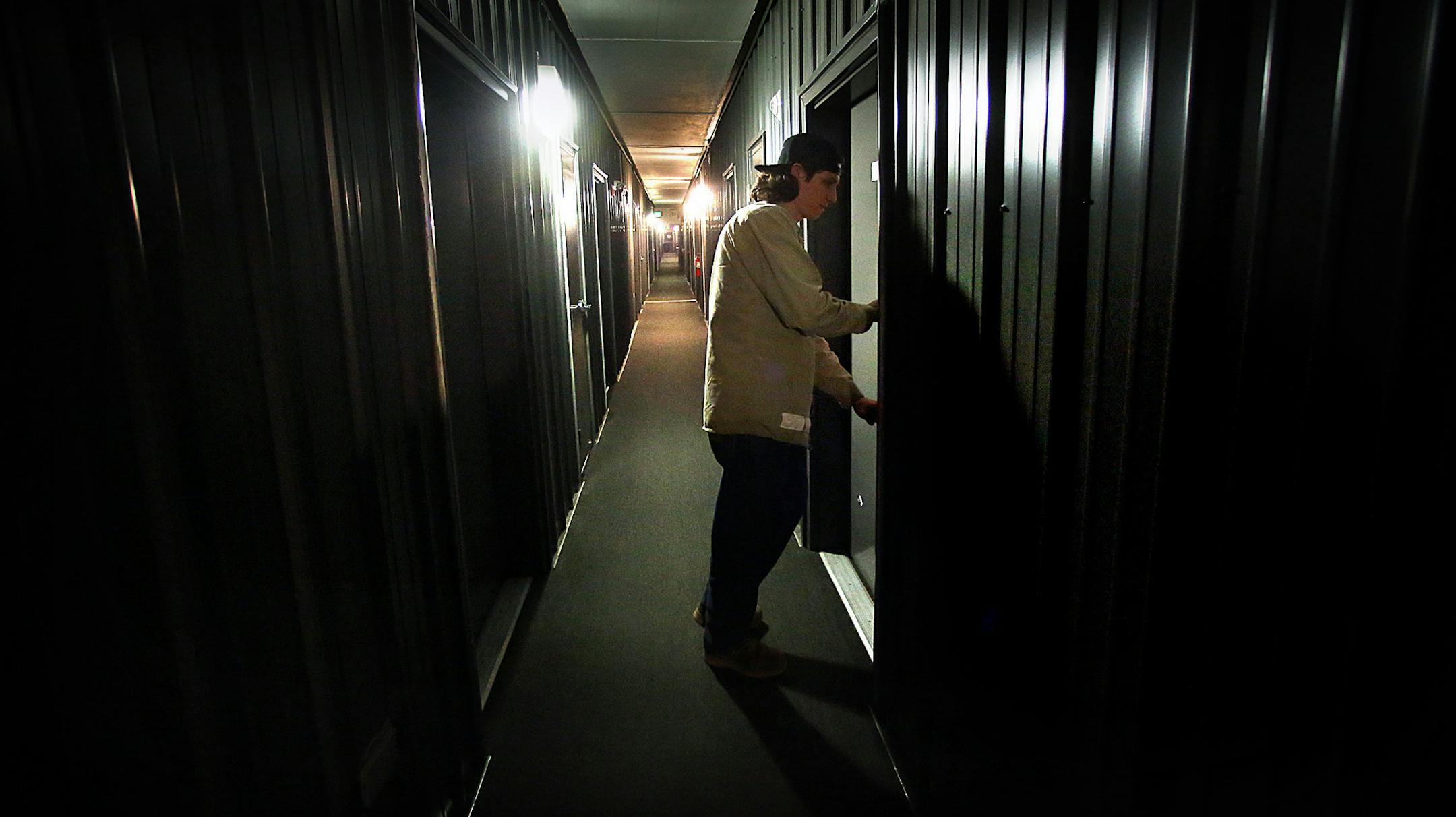 Ben Lewis and his friend, Jake Edgren (not pictured), lived in a man camp in Williston for a time, while working shifts that could last as long as 17 hours. ] (JIM GEHRZ/STAR TRIBUNE) / November 6, 2013, Williston, ND ‚Äì BACKGROUND INFORMATION- PHOTOS FOR USE IN THIRD PART OF NORTH DAKOTA OIL BOOM PROJECT: Army veterans Ben Lewis and Jake Edgren served in Afghanistan together and the friends are now working in the Bakken oil fields together. The pair first found work dismantlin