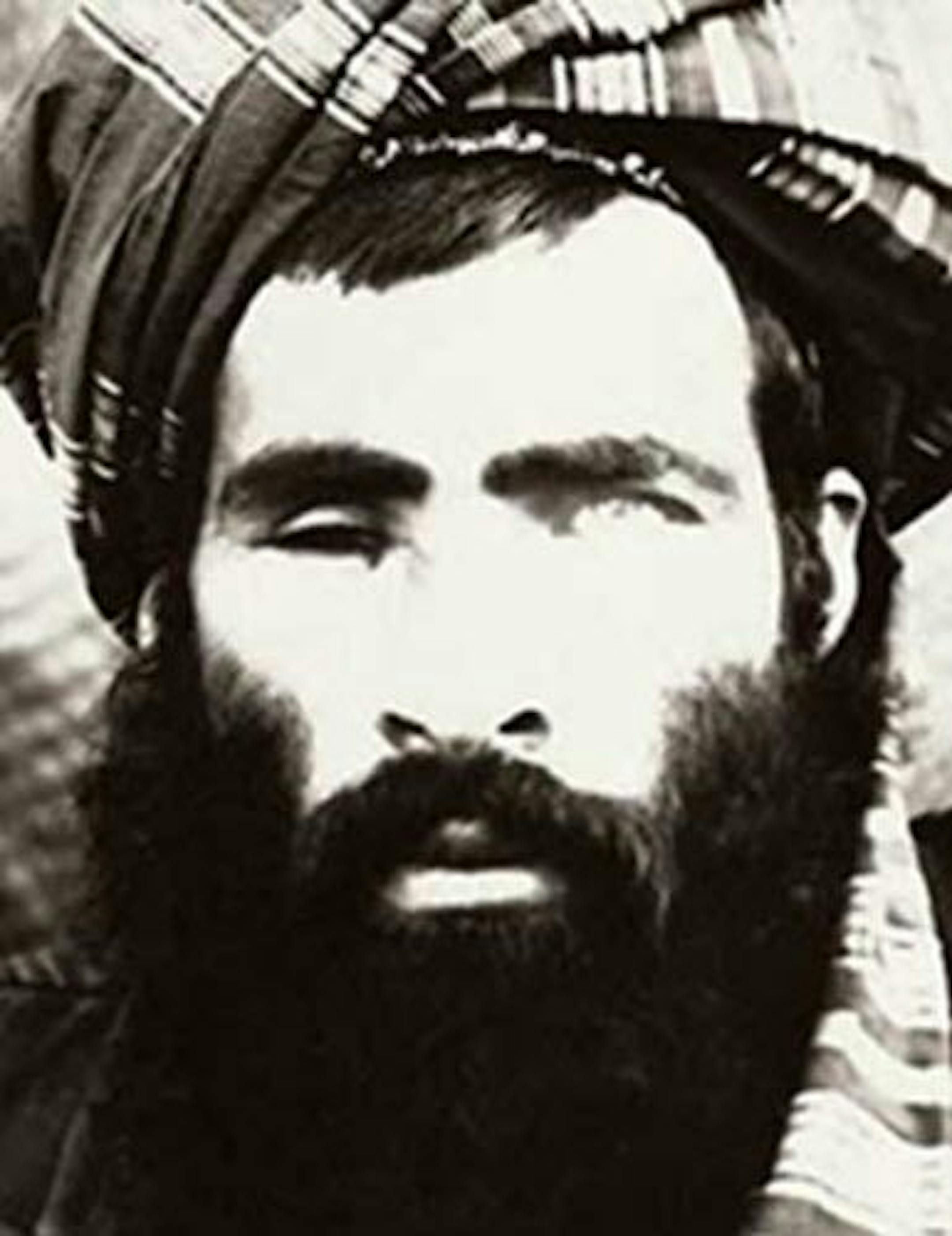 FILE � The Afghan government said on Wednesday, July 29, 2015, that it was investigating new reports that Mullah Muhammad Omar, the elusive leader of the Taliban, is dead. A photo believed to be of Mullah Omar which is part of a wanted poster produced by the FBI.