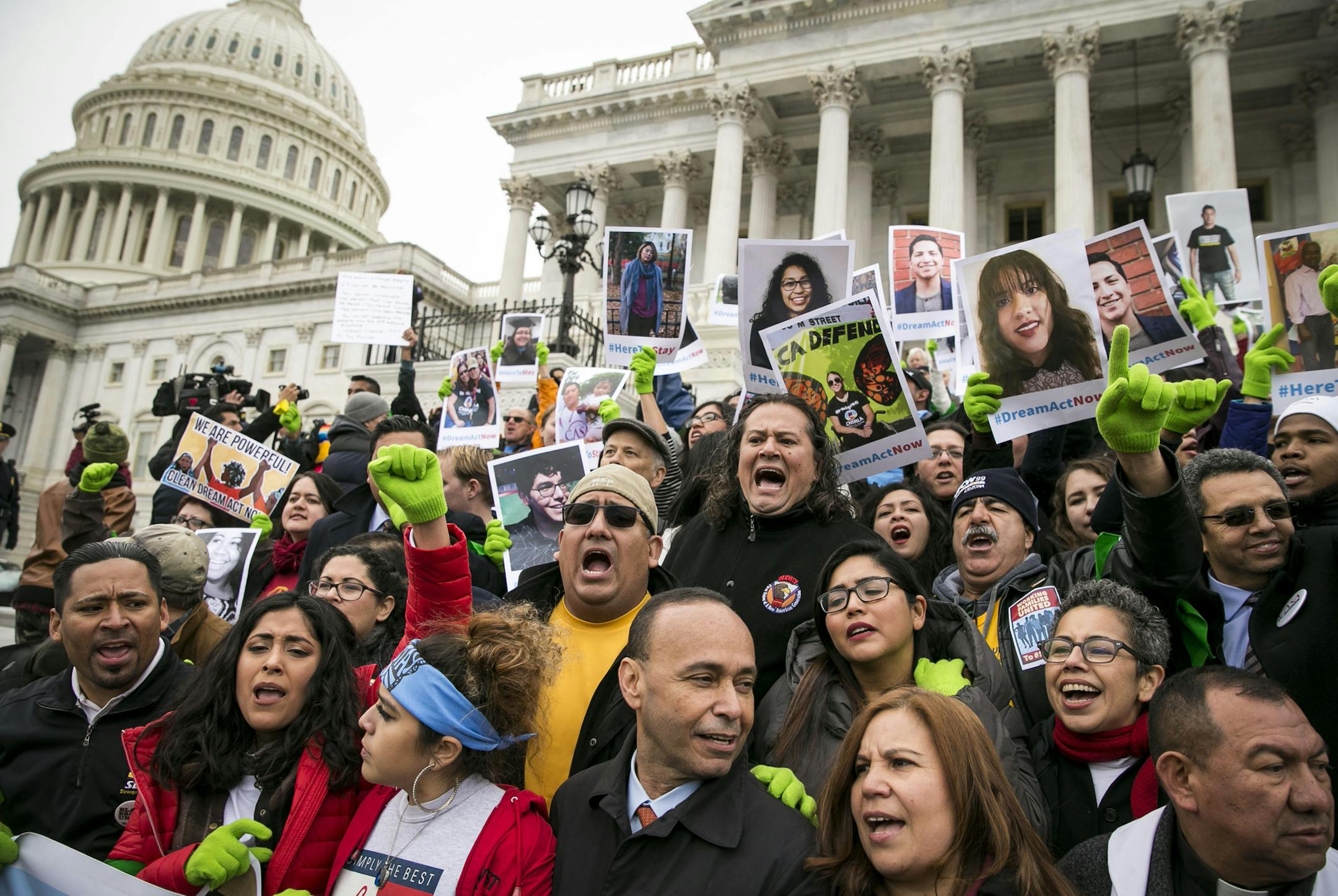 FILE-- Rep. Luis Gutierrez (D-Ill.), center bottom, joins a protest supporting protections for immigrants outside the Capitol in Washington, Dec. 6, 2017. As Congress considers a deal to provide relief for young immigrants brought to the U.S. illegally as children, President Donald Trump and his Republican allies are demanding an end to what they call ìchain migration,î or family-based immigration. (Al Drago/The New York Times)