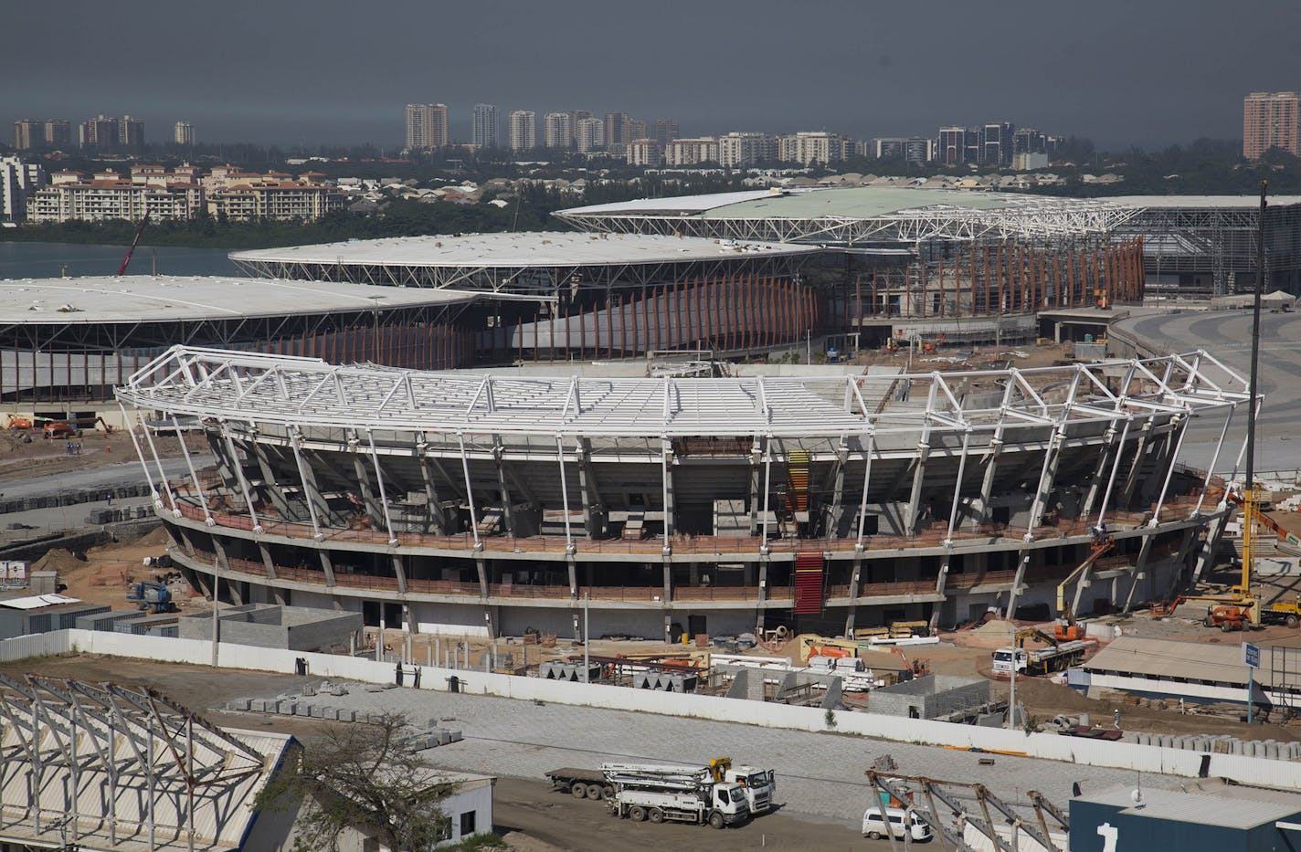 The Olympic Park which will host competitions during Rio's 2016 Olympics is seen under construction in Rio de Janeiro, Brazil, Tuesday, June 9, 2015. The Olympic Park is going up in one of Rio's wealthiest areas, and real estate prices are soaring there even as Brazil enters a recession. (AP Photo/Mauro Pimentel) ORG XMIT: XFD210