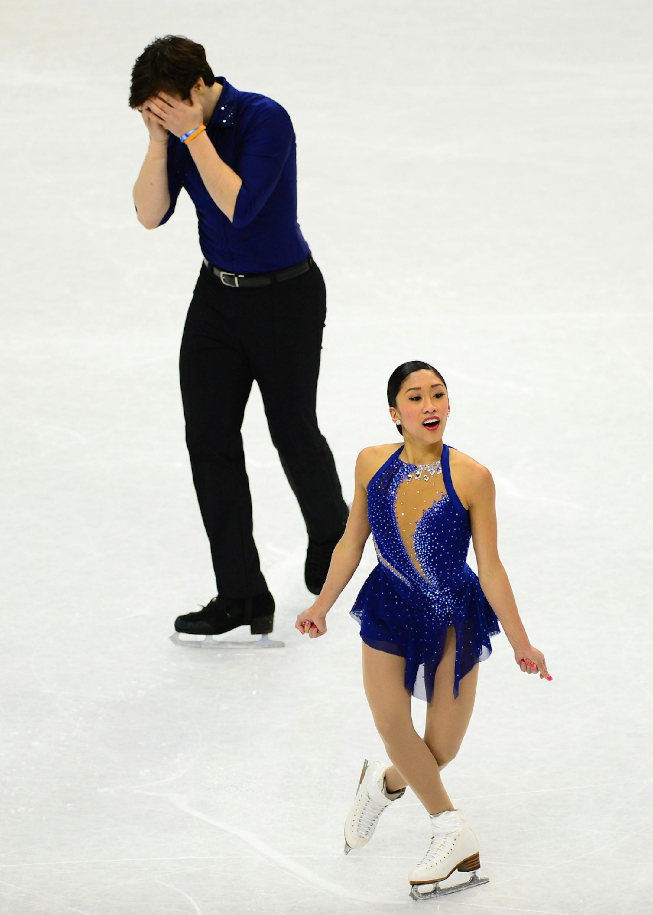 Zack Sidhu buried his head in his hands after a poor performance with Jessica Calalang in their championship pairs short program performance Thursday.