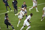 Minnesota United defender Michael Boxall (15) attempted a shot during stoppage time against Sporting Kansas City. ] aaron.lavinsky@startribune.com Min
