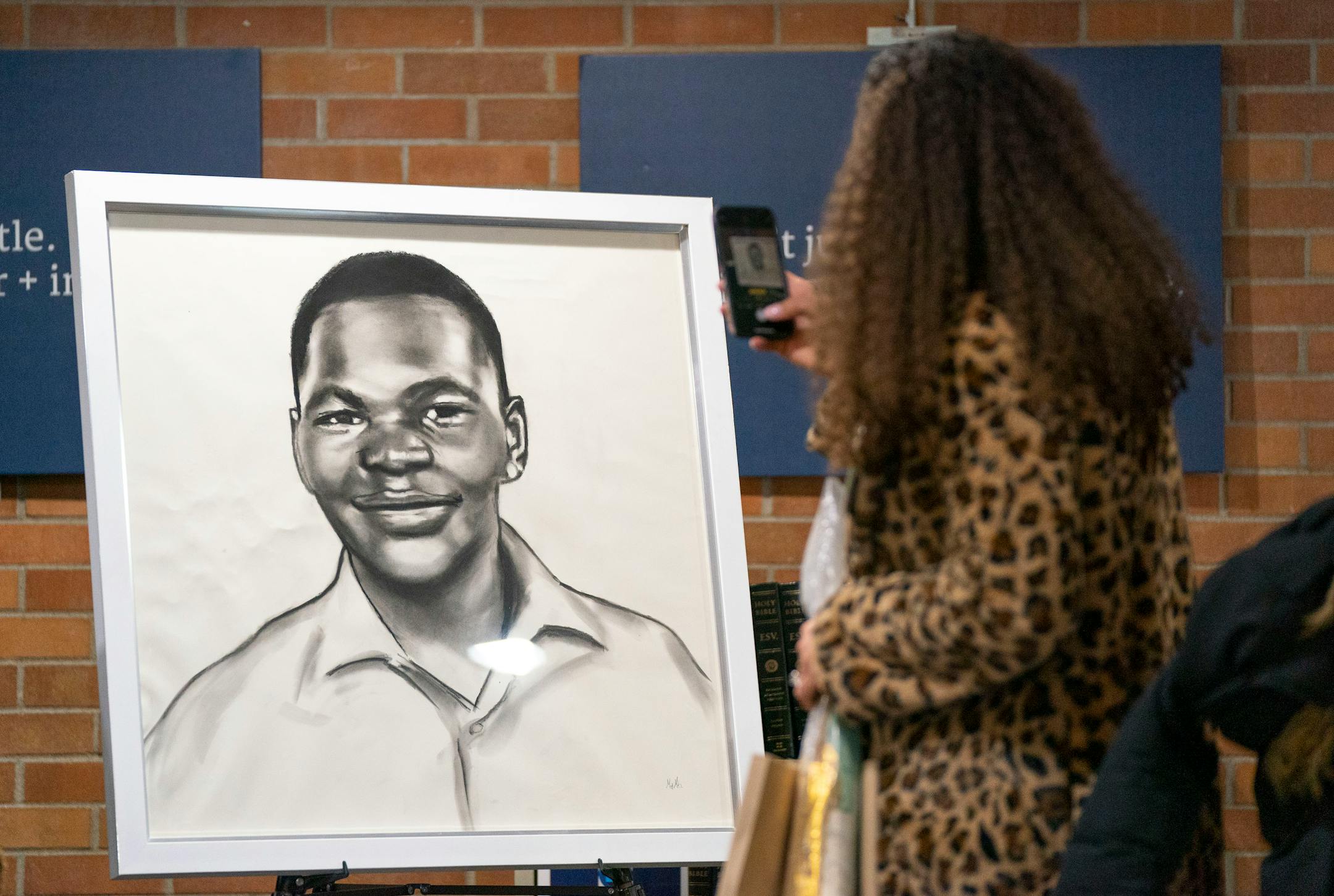 A portrait of Jahmari Rice was on display outside before his funeral Wednesday, Feb. 9, 2022 at Hope Presbyterian Church in Richfield.