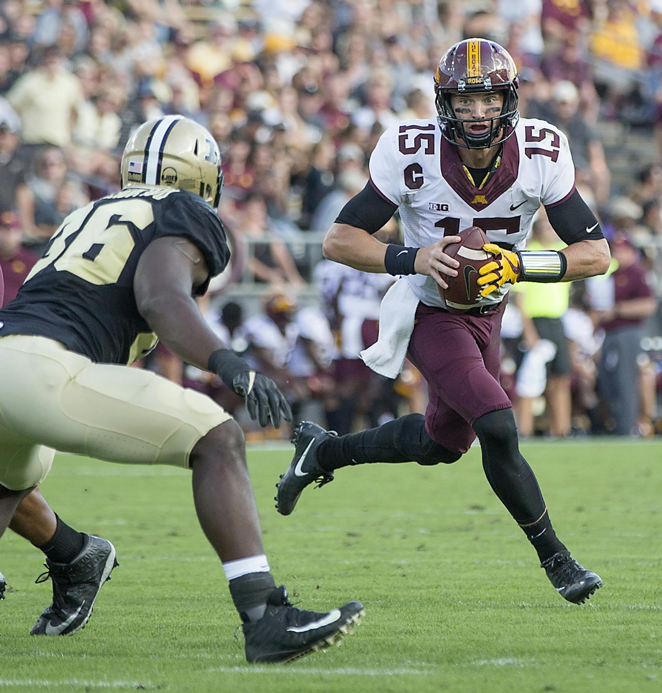 Minnesota's quarterback Conor Rhoda looked for an opening near the end zone during the second quarter the Gophers took on Purdue at Ross-Ade Stadium, Saturday, October 7, 2017 in West Lafayette, IN.