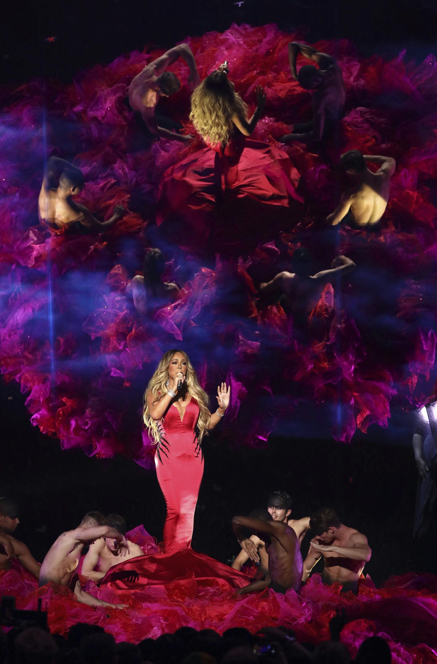 Mariah Carey performs "With You" at the American Music Awards on Tuesday, Oct. 9, 2018, at the Microsoft Theater in Los Angeles. (Photo by Matt Sayles/Invision/AP)