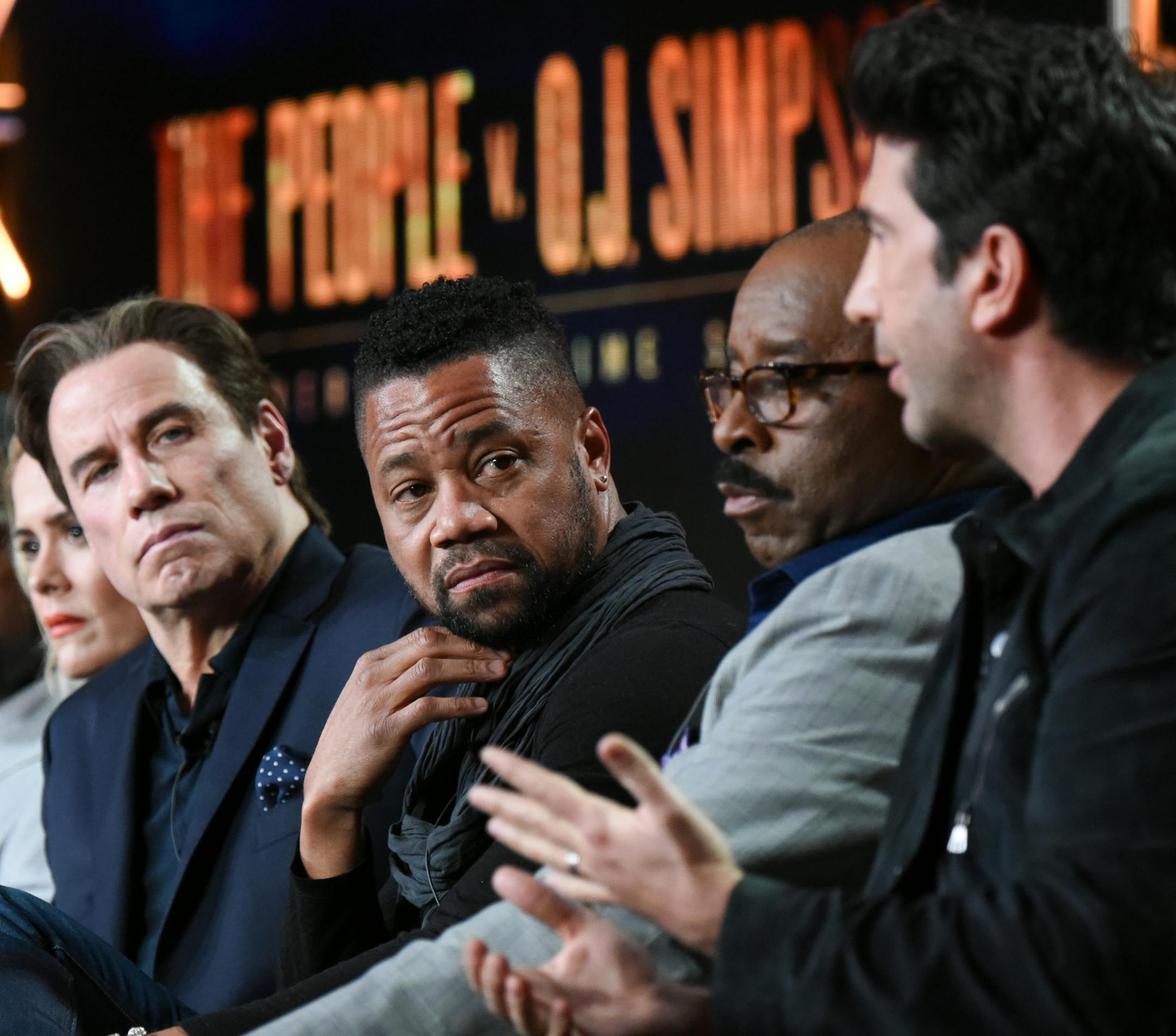 Actors Malcolm-Jamal Warner, from left, Sterling K. Brown, Sarah Paulson, John Travolta, Cuba Gooding Jr., Courtney B. Vance and David Schwinner participate in "The People v. O.J. Simpson" panel at the FX Networks Winter TCA on Saturday, Jan. 16, 2016, in Pasadena, Calif. (Photo by Richard Shotwell/Invision/AP)