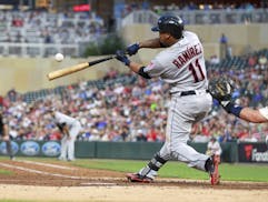 Cleveland Indians Jose Ramirez hits an RBI single off Minnesota Twins pitcher Kyle Gibson during the fifth inning.