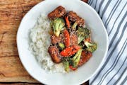 Soy Honey-Glazed Crispy Tofu with Broccoli and Carrots. Credit: Meredith Deeds, Special to the Star Tribune