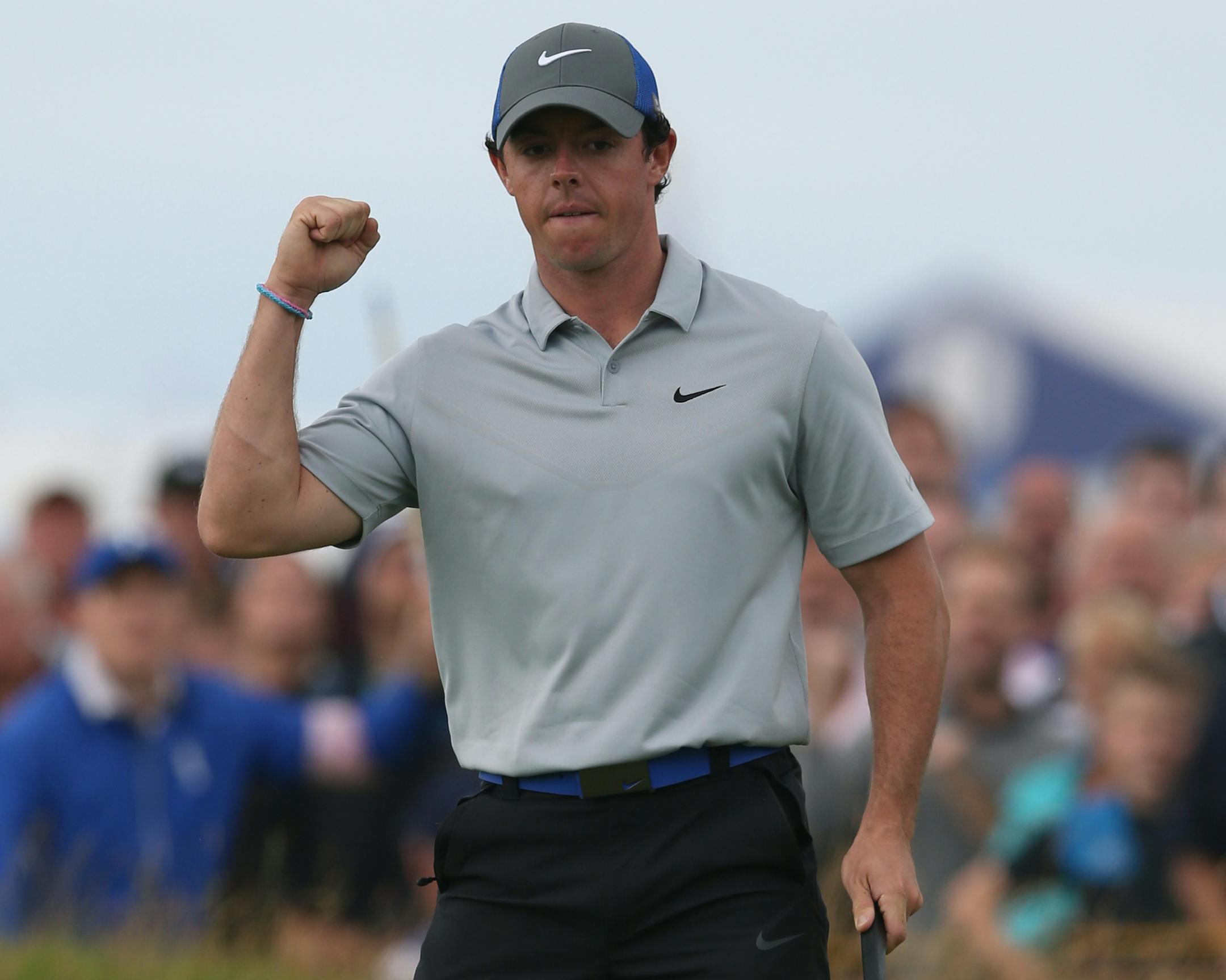 Rory McIlroy of Northern Ireland celebrates after playing an eagle on the 16th hole during the third day of the British Open Golf championship at the Royal Liverpool golf club, Hoylake, England, Saturday July 19, 2014. (AP Photo/Jon Super)