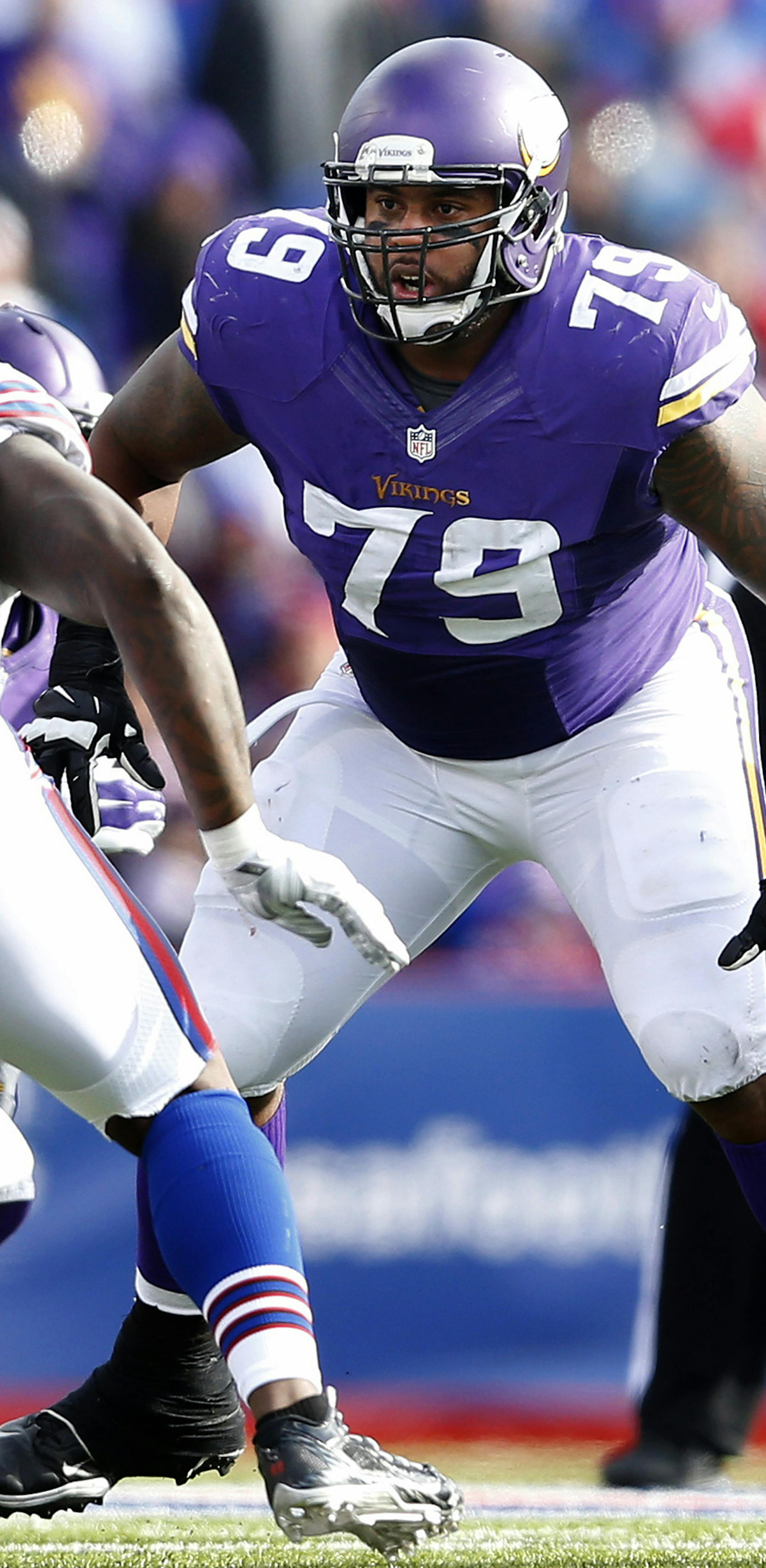 Minnesota Vikings offensive lineman Mike Harris (79) and center Joe Berger (61) play during the third quarter of their game against the Buffalo Bills on Sunday, Oct. 19, 2014, at Ralph Wilson Stadium in Orchard Park, N.Y. (Carlos Gonzalez/Minneapolis Star Tribune/MCT) ORG XMIT: 1158870