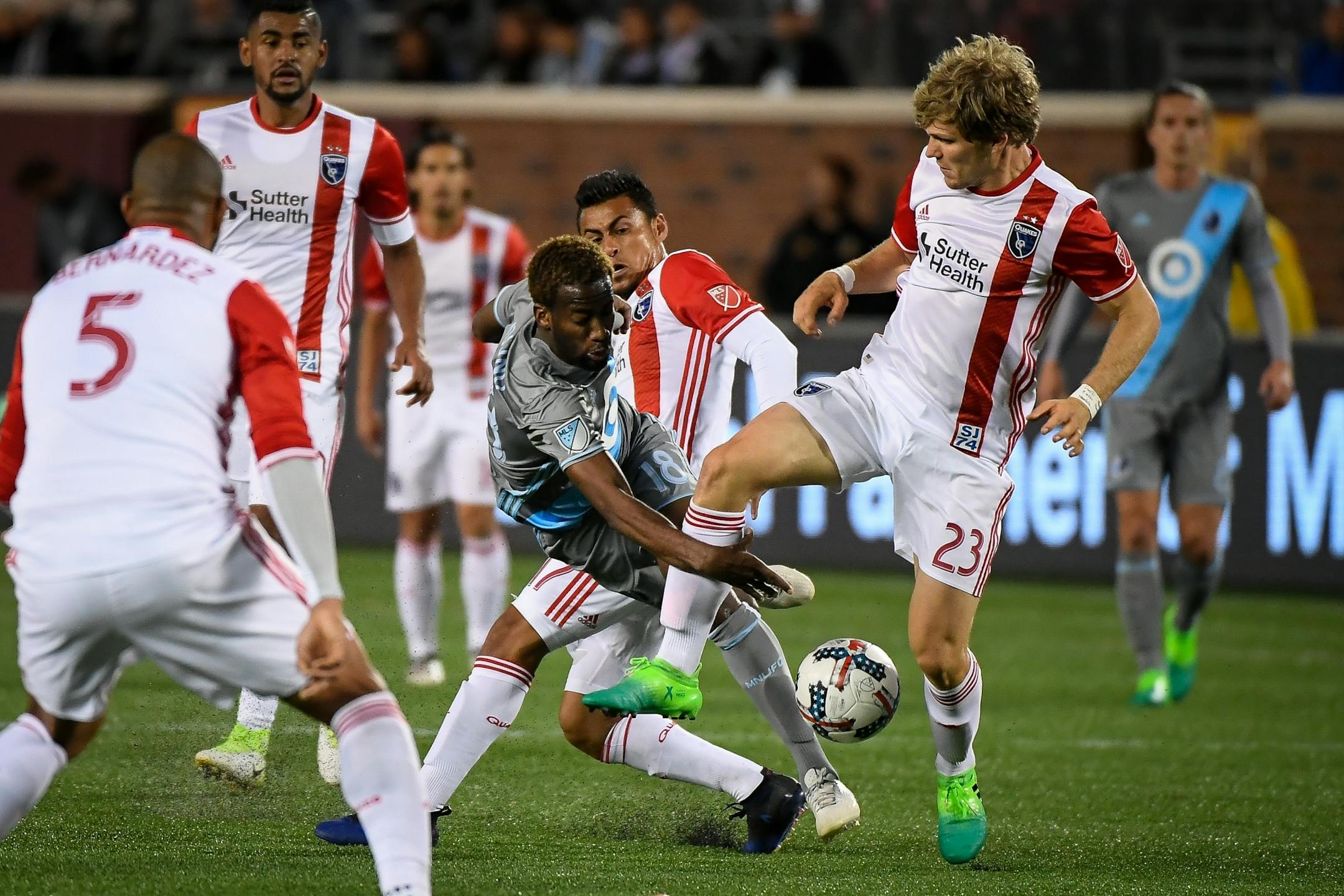 Minnesota United midfielder Kevin Molino (18) was tackled from behind by San Jose Earthquakes defenders, leading to a free kick in the second half.