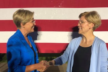 Seeing double? It's not you, it's Stephanie Oyen (left), an Elizabeth Warren doppelganger at the presidential candidate's rally in Minnesota on Monday