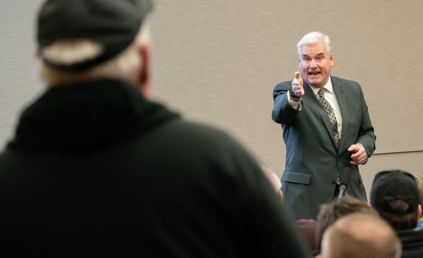 U.S. Rep. Tom Emmer answered a question from Darrell Maus of Andover during Emmer's town hall Tuesday morning in Ramsey. Frustrations flared over immigration policy and the monthlong government shutdown at the testy town hall meeting.