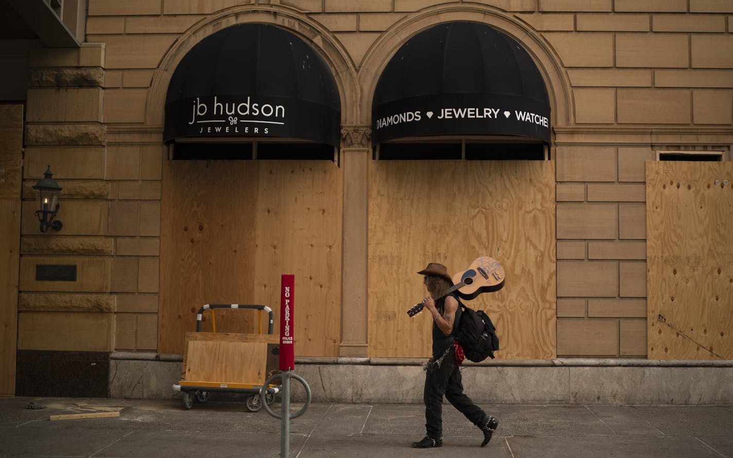 An hour before curfew on Thursday, Aug. 27, South 8th Street in downtown Minneapolis was quiet.