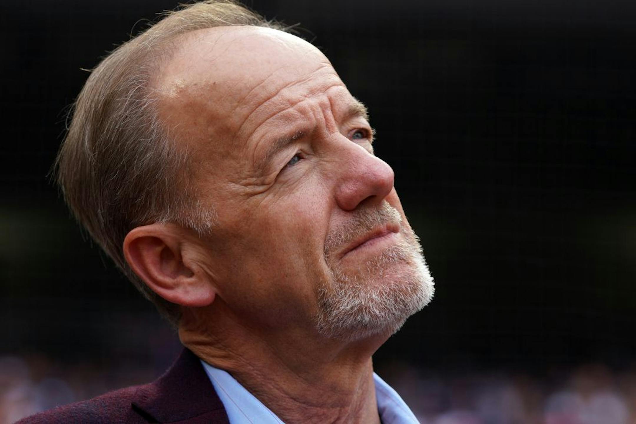 Minnesota Twins team owner Jim Pohlad watched from the field during a pregame ceremony to retire Joe Mauer's number 7 Saturday.