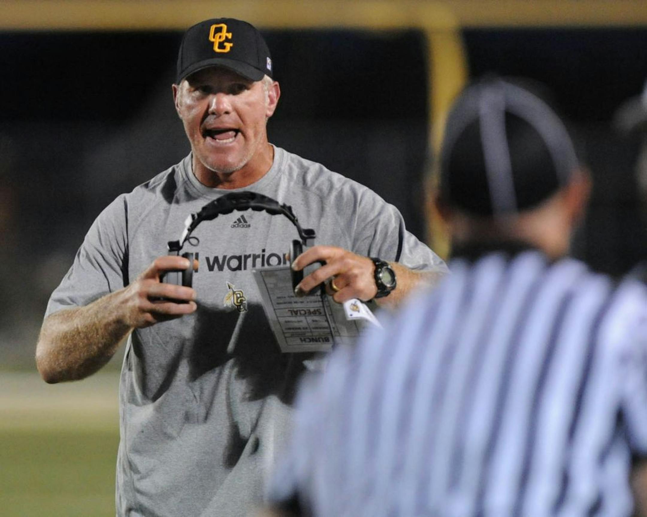 Oak Grove assistant coach Brett Favre expresses his emotion after a failed third down pass as they took on Sumrall during a high school football game in Hattiesburg Miss., Friday Aug. 17, 2012.