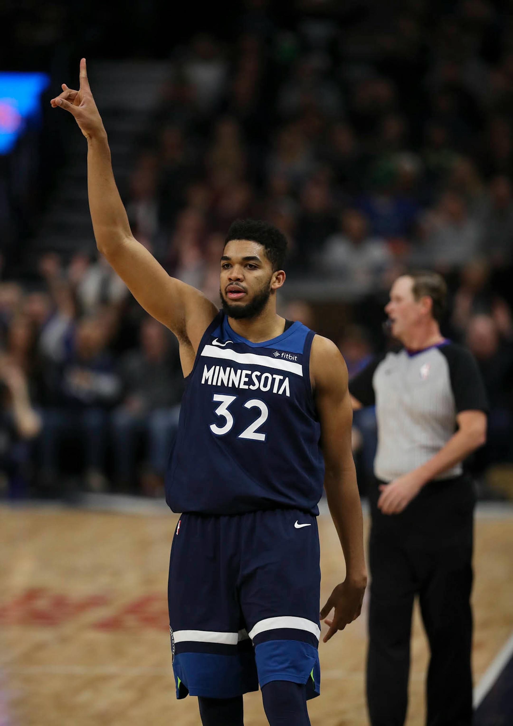 Minnesota Timberwolves center Karl-Anthony Towns signaled a successful basket from the corner in the fourth quarter. He led all scorers with 29 points.