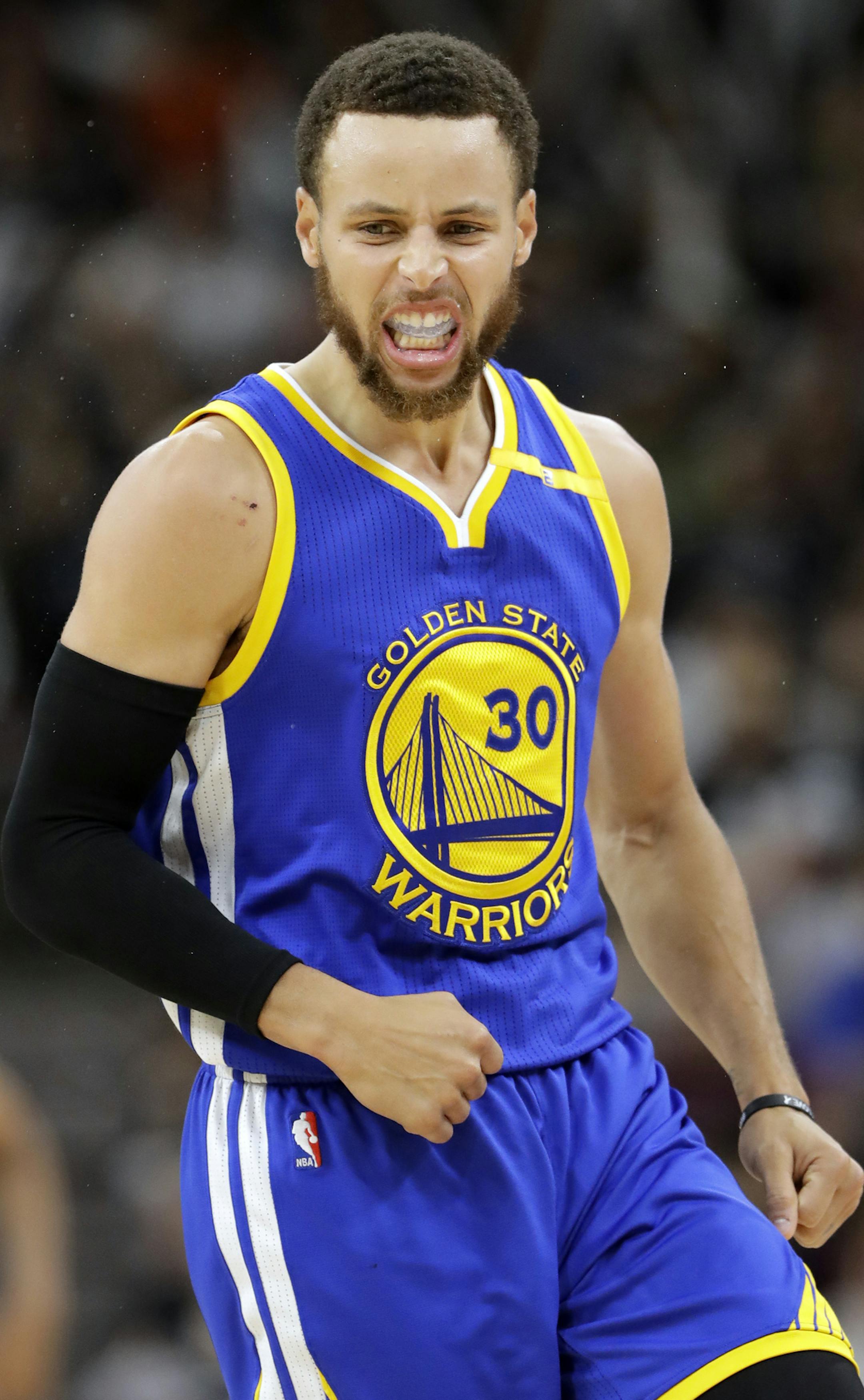 Golden State Warriors guard Stephen Curry (30) celebrates a basket against the San Antonio Spurs during the second half in Game 4 of the NBA basketball Western Conference finals, Monday, May 22, 2017, in San Antonio. (AP Photo/Eric Gay)