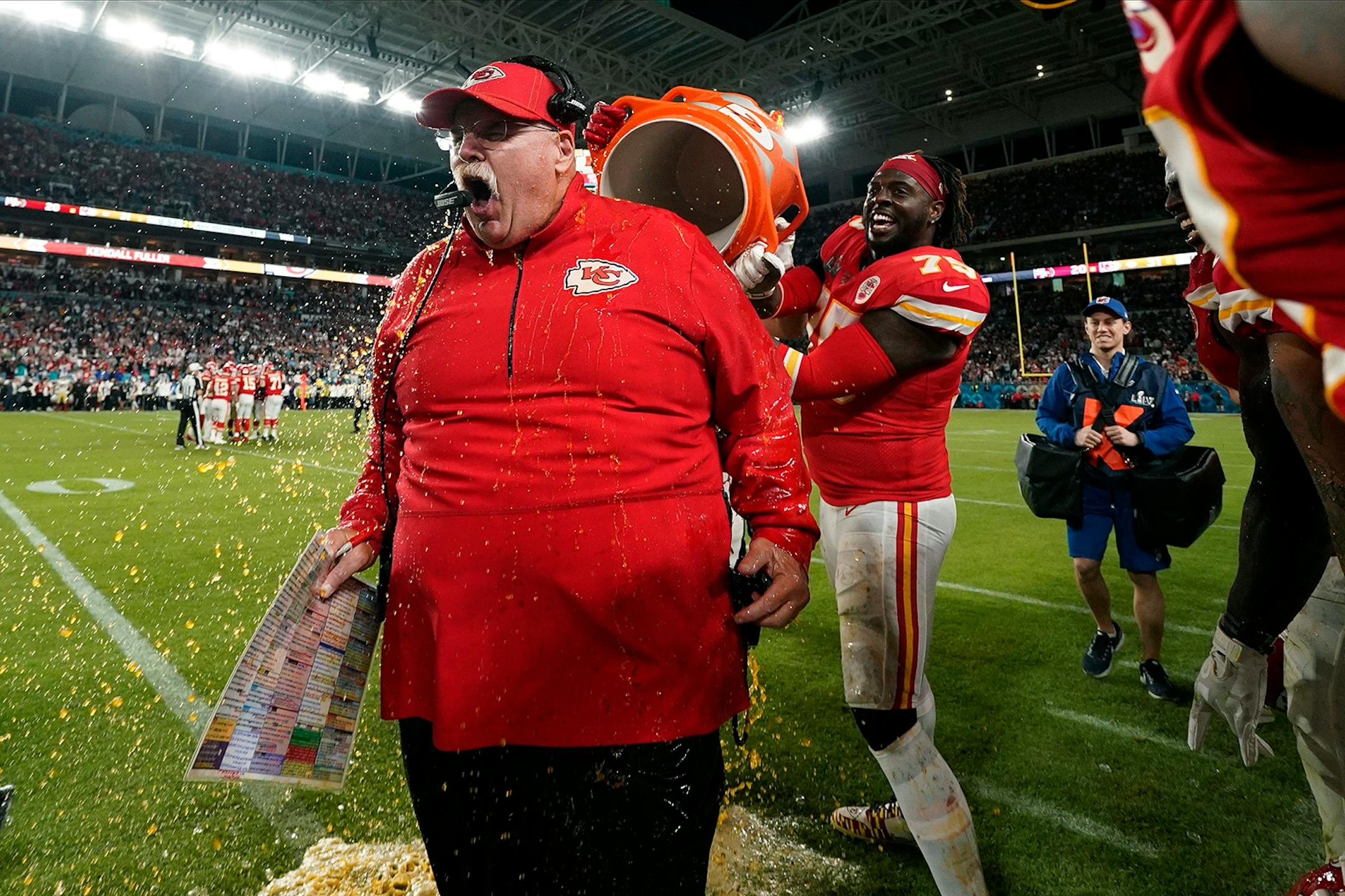 Kansas City Chiefs head coach Andy Reid reacts after being doused during the second half of the NFL Super Bowl 54 football game against the San Francisco 49ers Sunday, Feb. 2, 2020, in Miami Gardens, Fla.