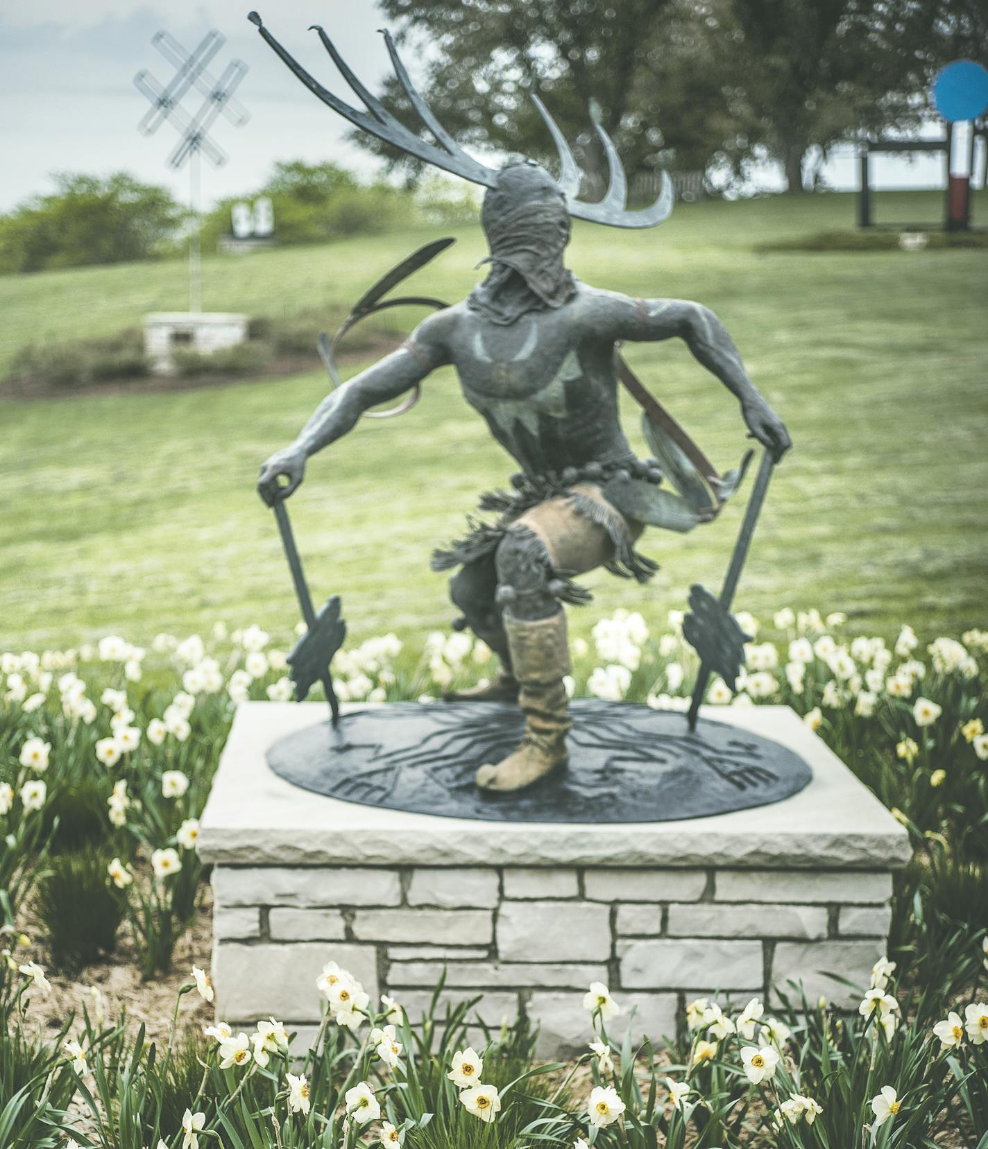 "Apache Mountain Spirit Dancer" by artist Craig Dan Goseyun is part of the permanent collection of the Harrison Sculpture Garden. Landscape gardener Erik Lemke makes sure the plants and grasses complement the art work.]The Arboretum is expanding their programming to include more art. This story will delve into that, looking at the current origami by artists Jennifer and Kevin Box in the garden exhibition. Richard Tsong-Taatarii&#xef;rtsong-taatarii@startribune.com