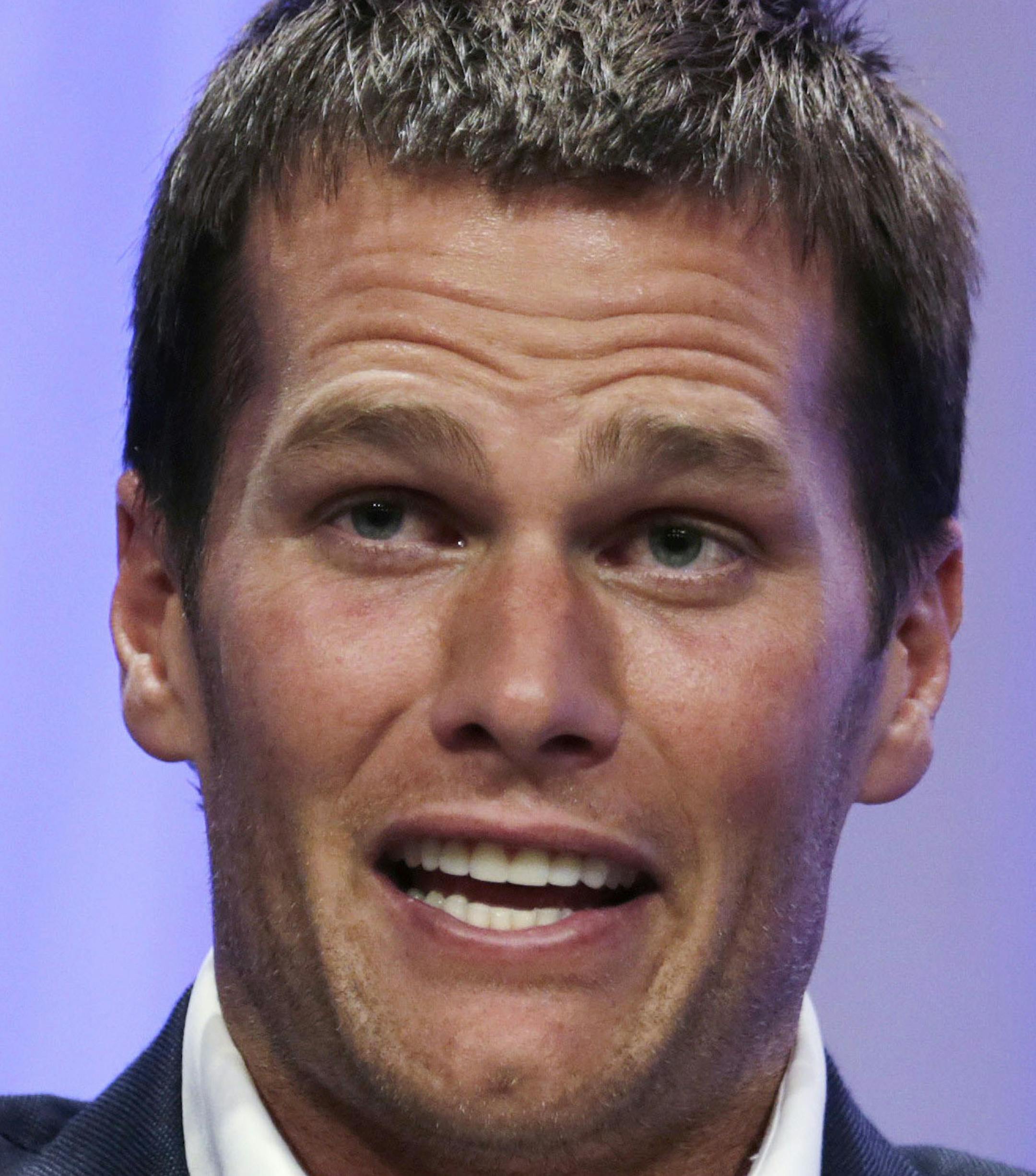 FILE - In a Thursday, May 7, 2015 file photo, New England Patriots quarterback Tom Brady gestures during an event at Salem State University in Salem, Mass. The NFL suspended Brady for the first four games on Monday, May 11, 2015, for his role in a scheme to deflate footballs used in the AFC title game. (AP Photo/Charles Krupa, Pool, File)
