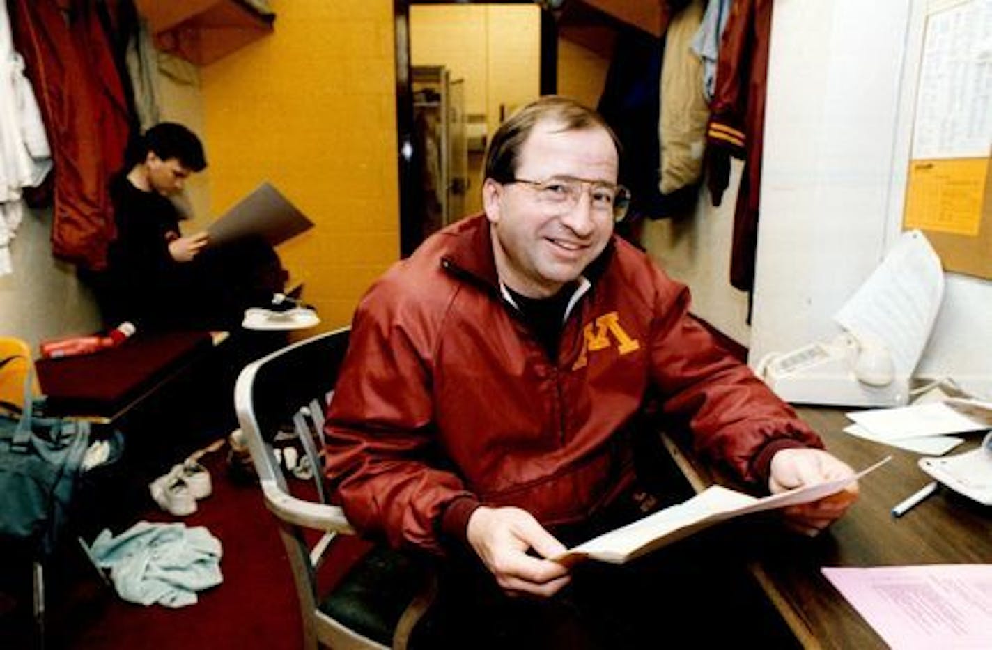 March 26, 1989 Why is this man smiling? It might be that despite the pressures of his job, Gophers hockey coach Doug Woog is right where he wants to be with his life.  March 23, 1989  Joey McLeister, Minneapolis Star Tribune