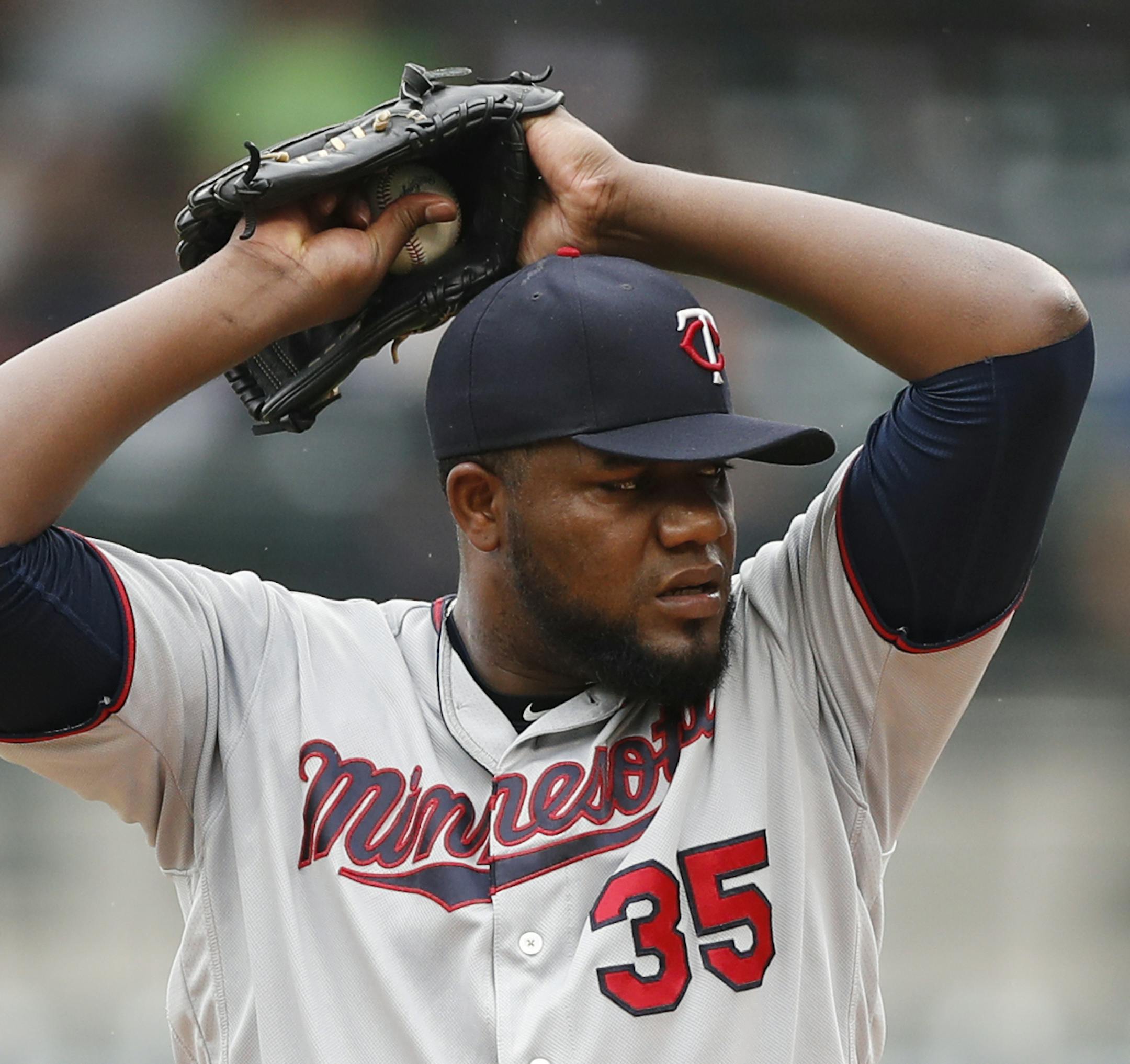 Minnesota Twins starting pitcher Michael Pineda prepares to throw during the first inning of a baseball game against the Detroit Tigers, Sunday, Sept. 1, 2019, in Detroit. (AP Photo/Carlos Osorio)