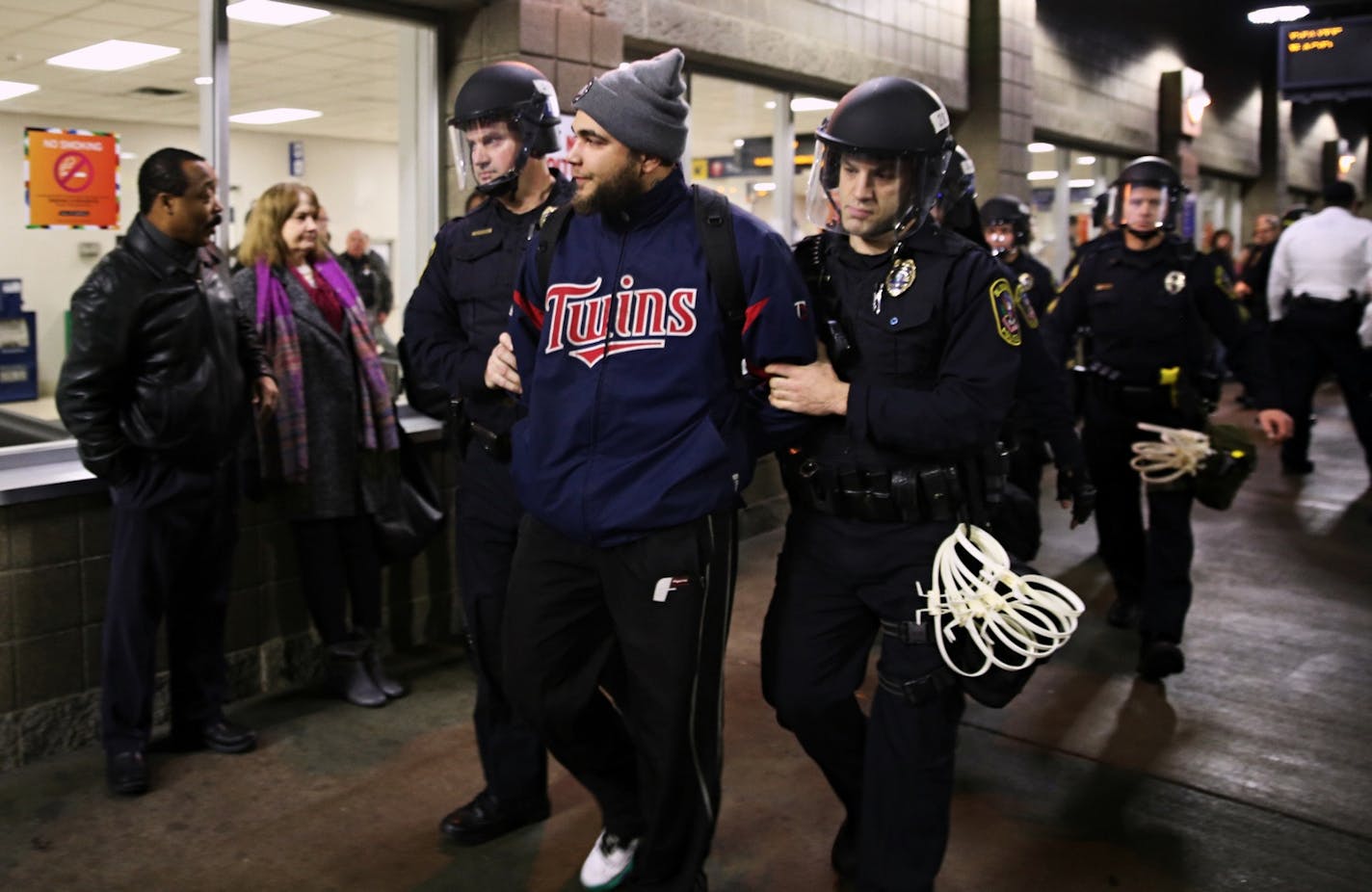 Law enforcement detained a protester at the Mall of America.