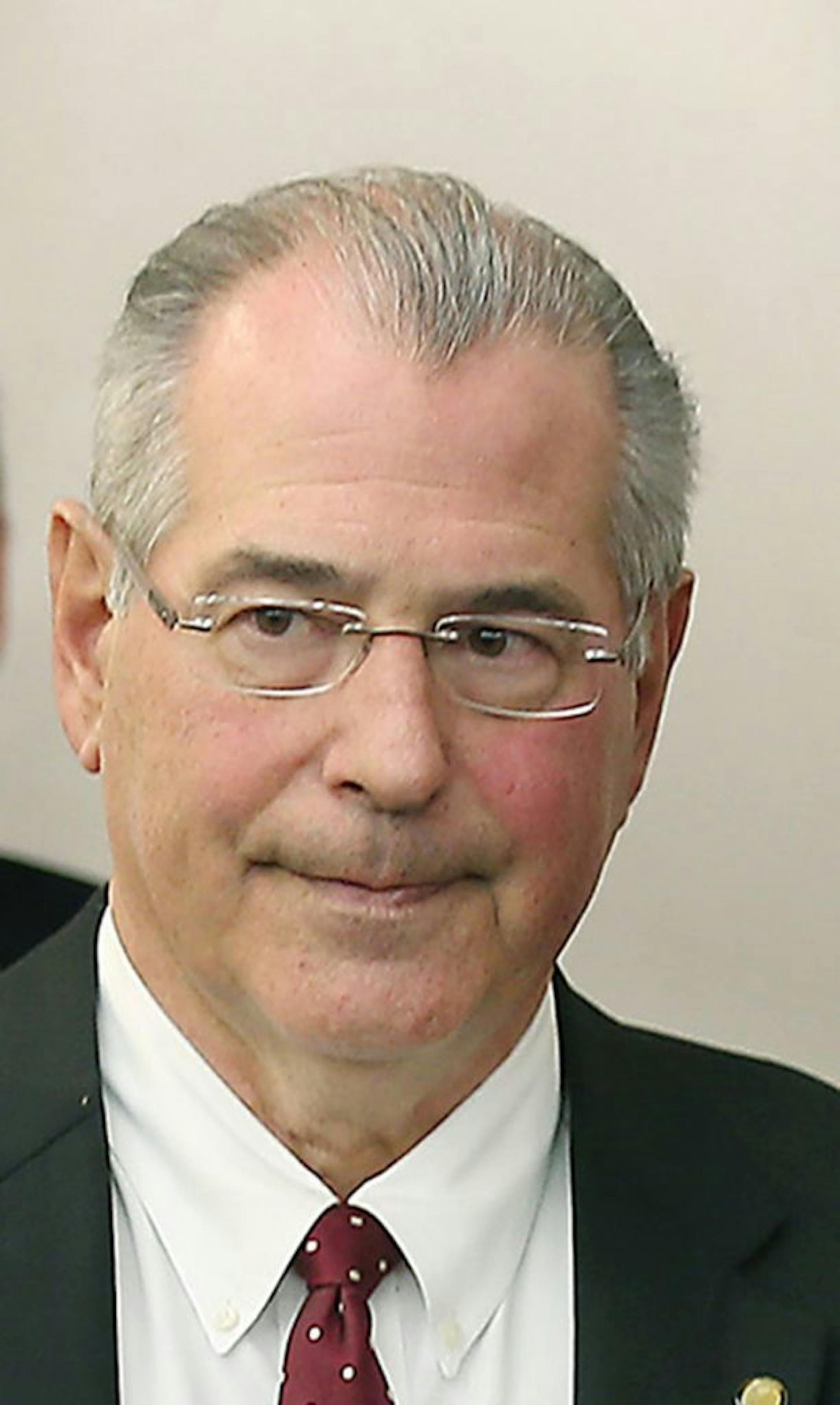 Hennepin County Attorney Mike Freeman arrives for a news conference Wednesday, March 16, 2016, at the Government Center in Minneapolis. Freeman said Wednesday that after months of careful consideration, he's decided he will not rely on a grand jury to determine whether two Minneapolis police officers should be charged in the shooting death of Jamar Clark. Freeman said he will make the charging decision himself. (Elizabeth Flores/Star Tribune via AP) MANDATORY CREDIT; ST. PAUL PIONEER PRESS OUT;
