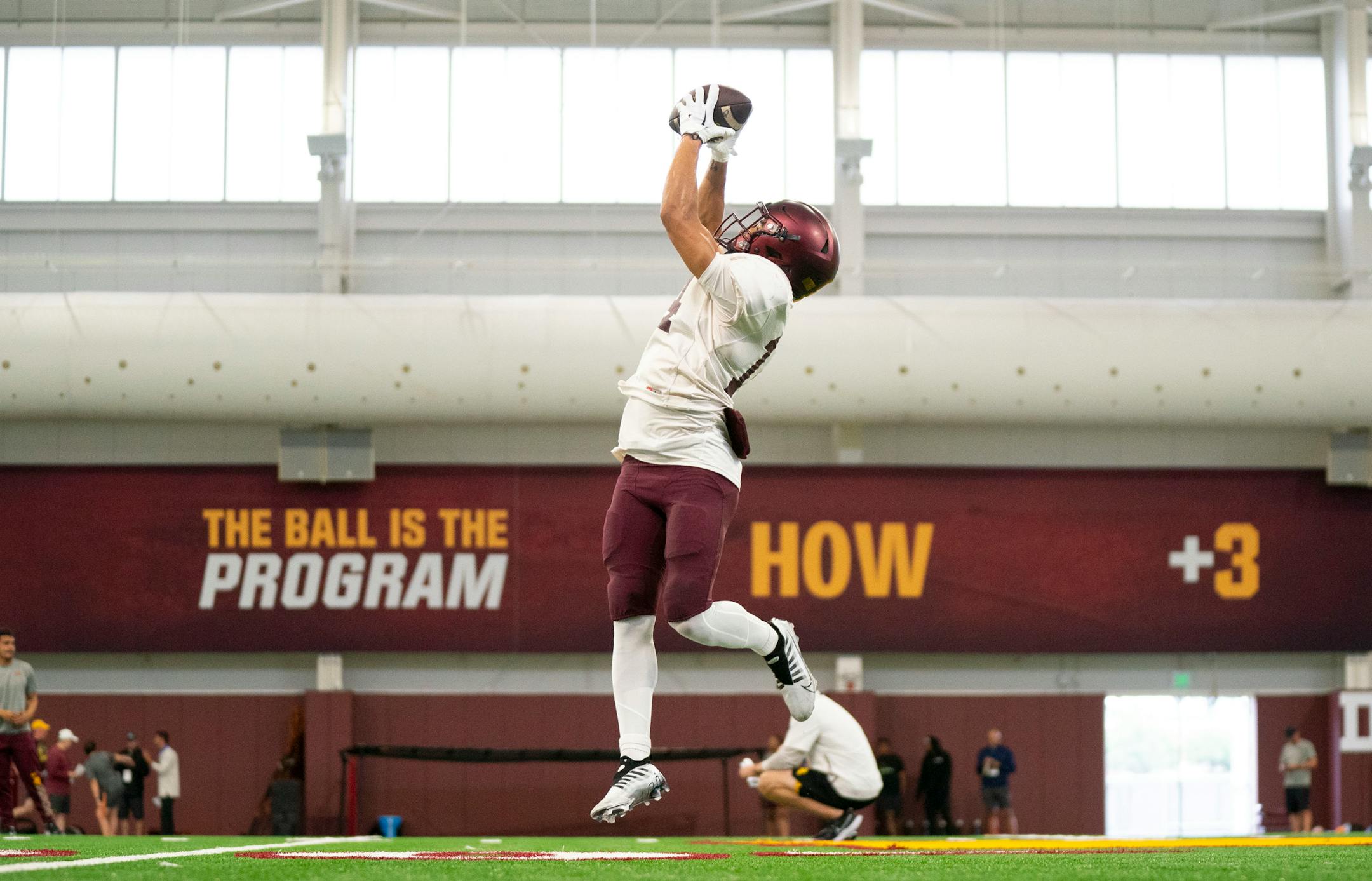 Gophers wide receiver Evan Redding makes a catch during the football team's first open practice of the season Saturday, August 6, 2022 in the Gibson/Nagurski Football Practice Facility on the campus of the University of Minnesota in Minneapolis.