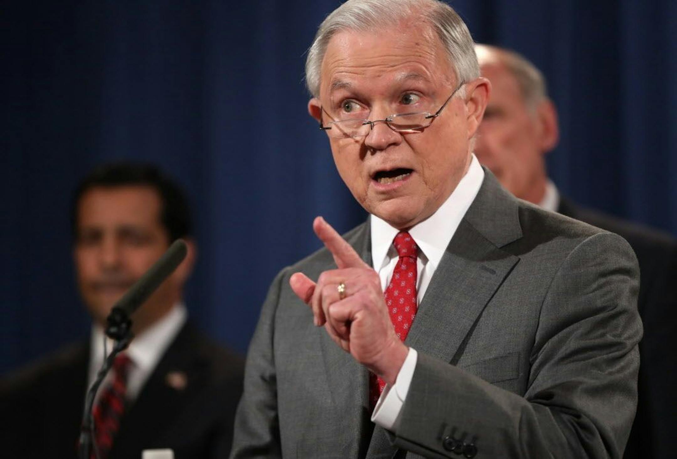 Attorney General Jeff Sessions, accompanied by, from left, National Counterintelligence and Security Center Director William Evanina, Director of National Intelligence Dan Coats, speaks during a news conference at the Justice Department in Washington, Friday, Aug. 4, 2017, on leaks of classified material threatening national security.