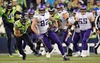 Vikings tight end Kyle Rudolph (82) gained yards off a throw from Vikings quarterback Kirk Cousins (8) in the fourth quarter. ] ANTHONY SOUFFLE &#x202