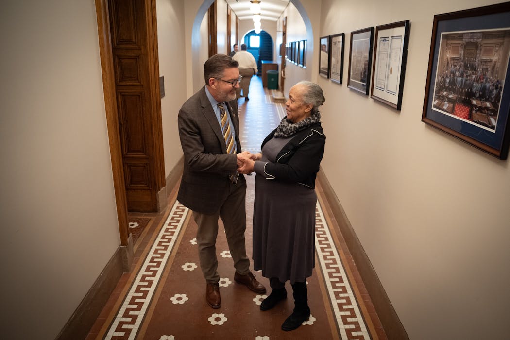 Sandra Johnson gets a private meeting with Sen. Scott Dibble, DFL-Minneapolis, just off the Senate floor during her visit to the Capitol on Wednesday.