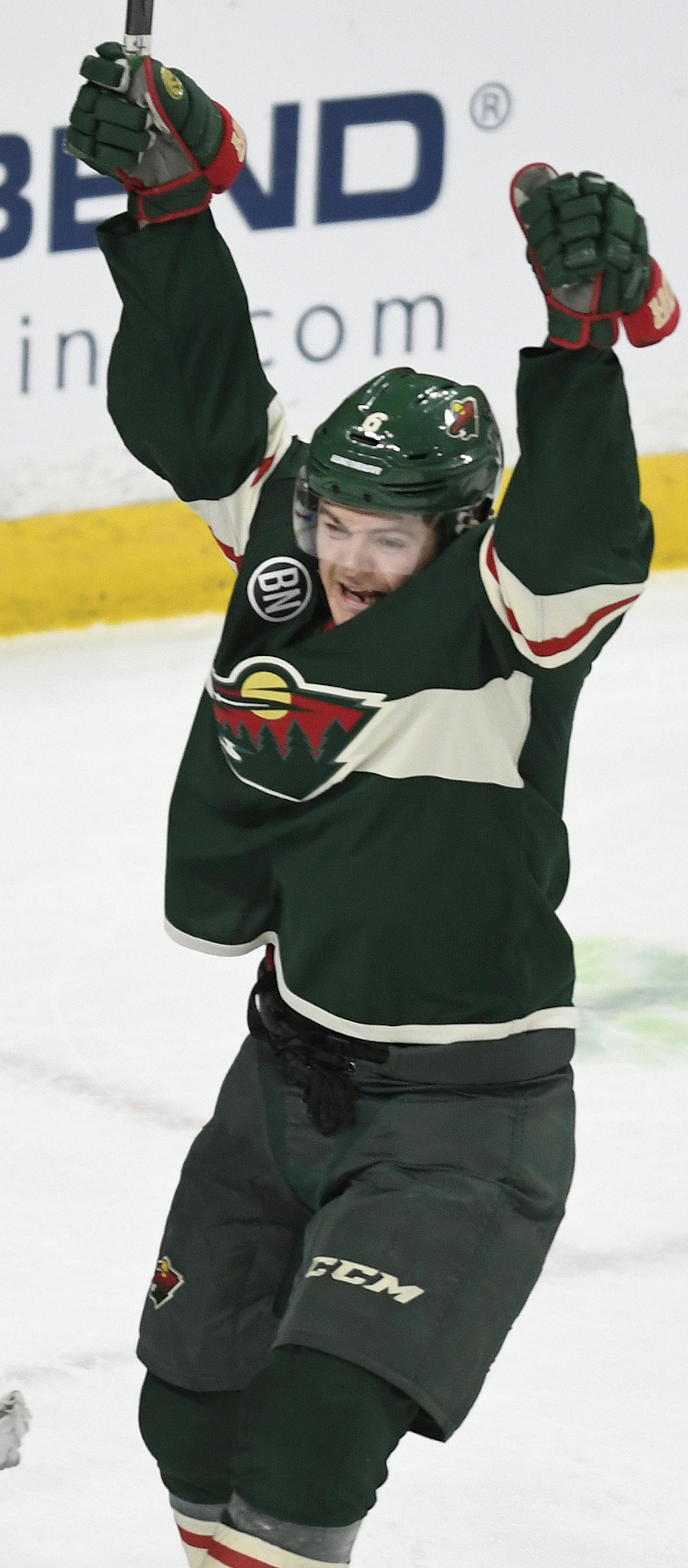 Minnesota Wild's Ryan Donato, right, celebrates his second goal in front of New York Rangers goalie Henrik Lundqvist, of Sweden, in the first period of an NHL hockey game Saturday, March 16, 2019, in St. Paul, Minn. (AP Photo/Tom Olmscheid)