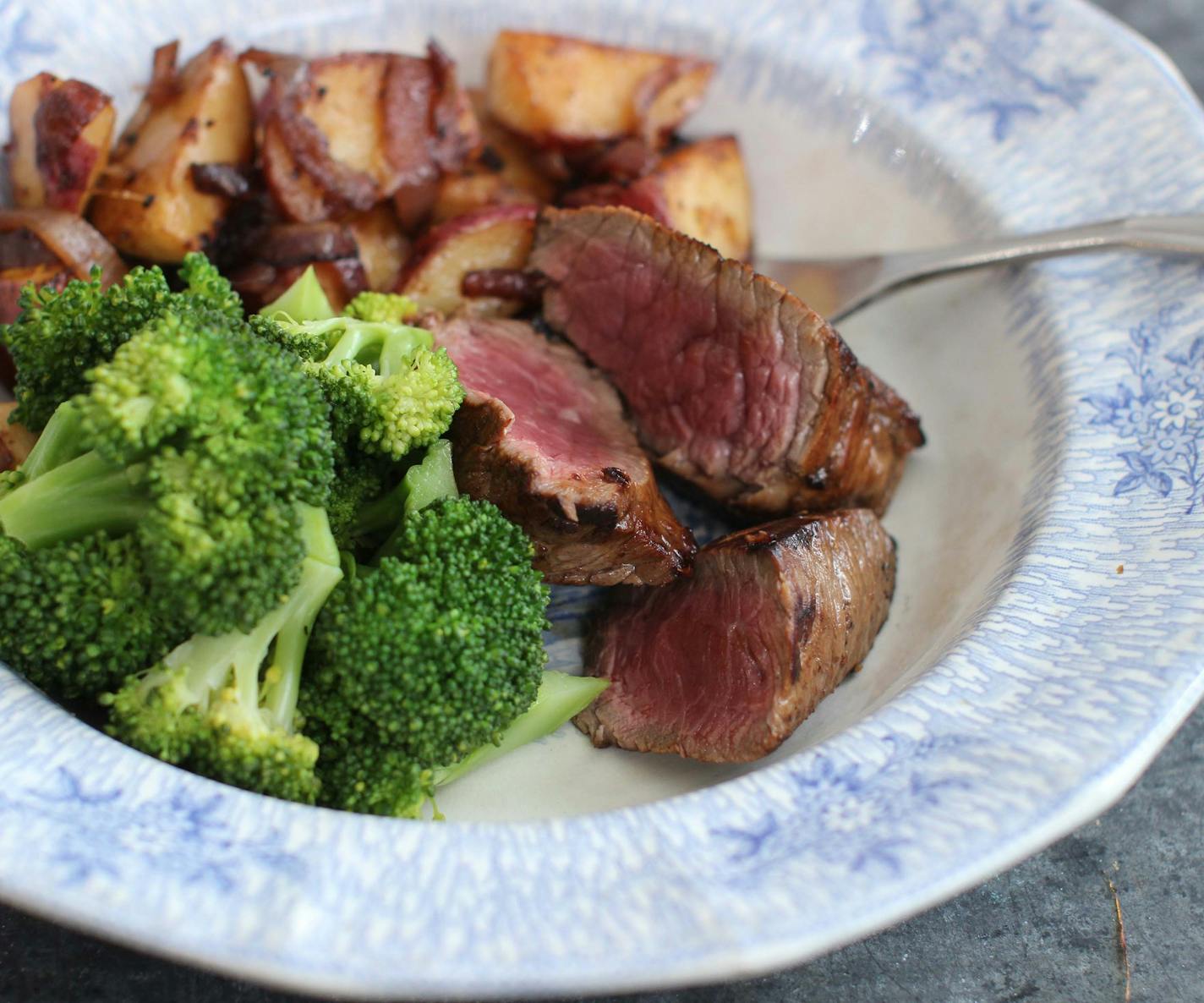 This Feb. 8, 2016 photo shows Petite beef sirloin in Concord, N.H. Petite beef sirloin is a great cut of meat, is usually is less expensive than the larger filet mignon cuts and it cooks up quite quickly. (AP Photo/Matthew Mead)