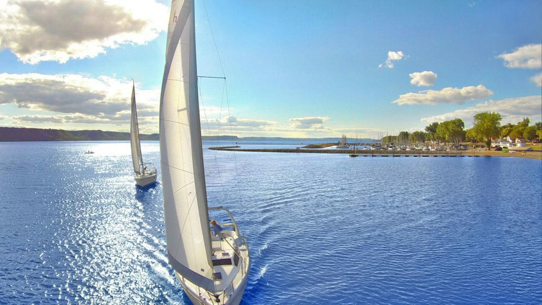 Dave Sheridan skippered his 31-foot sailboat Dragonfly on Lake Pepin, with his second ship, Messenger, close behind.