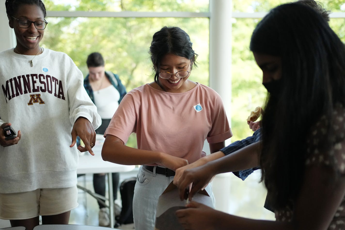 Maneeya Leung, center, a student at Eden Prairie High School, packed up with her classmates following an equity council meeting Wednesday. ] ANTHONY SOUFFLE • anthony.souffle@startribune.com