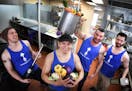 Performance Meals staffers Cameron Anderson, Eddie LoneEagle, owner Adrian De Los Rios and Kyle Storley, in their Robbinsdale kitchen.