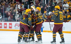 Gophers players celebrated a goal during the 2024-25 season.