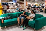 Customers shop for furniture at an Ikea in Beijing, May 6, 2018. Vintage resalers say they sell a lot of pieces to customers in Asian countries where 