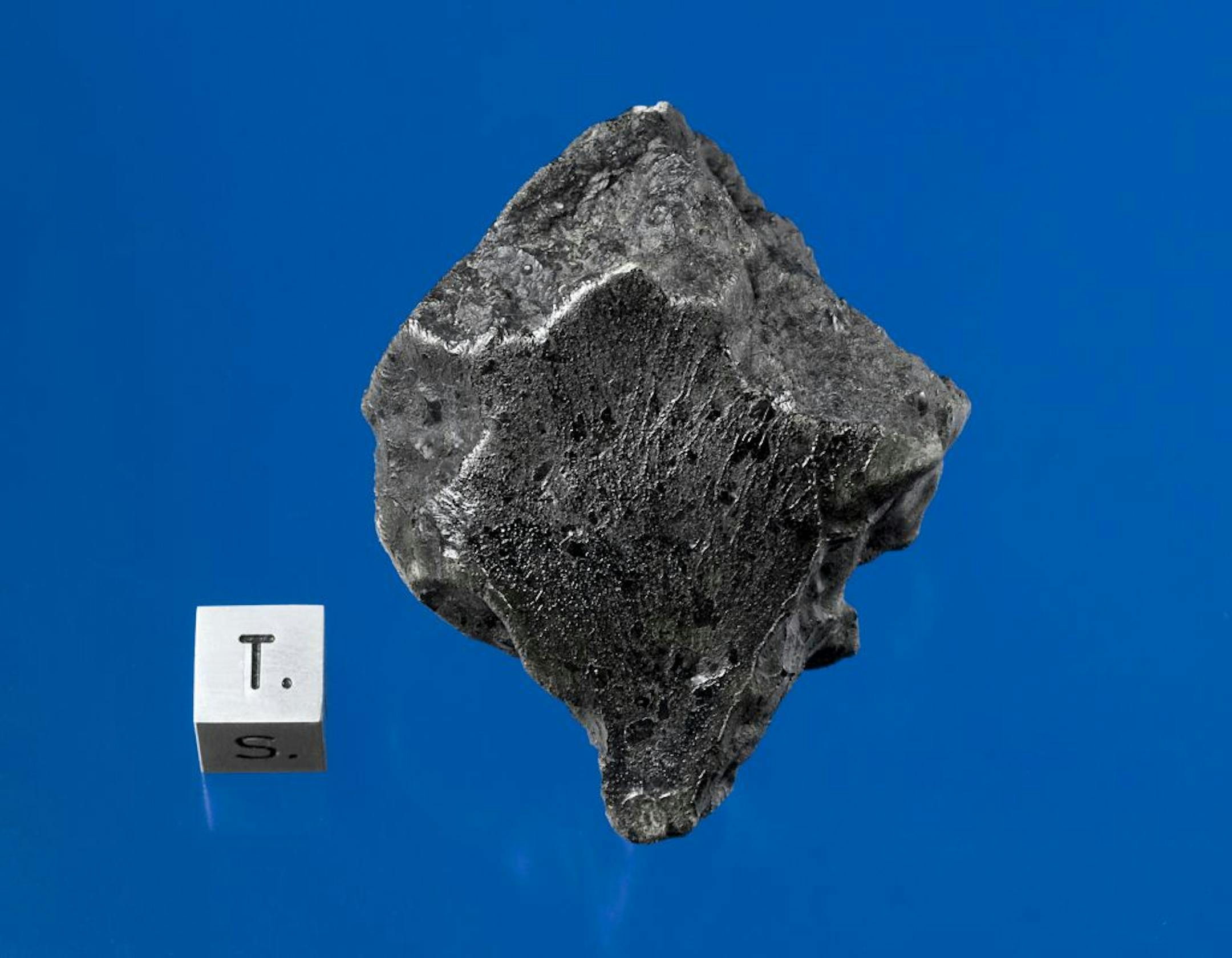 About 15 pounds of scorched and shattered Martian rock, including a piece shown above, have been recovered from the desert in Morocco.