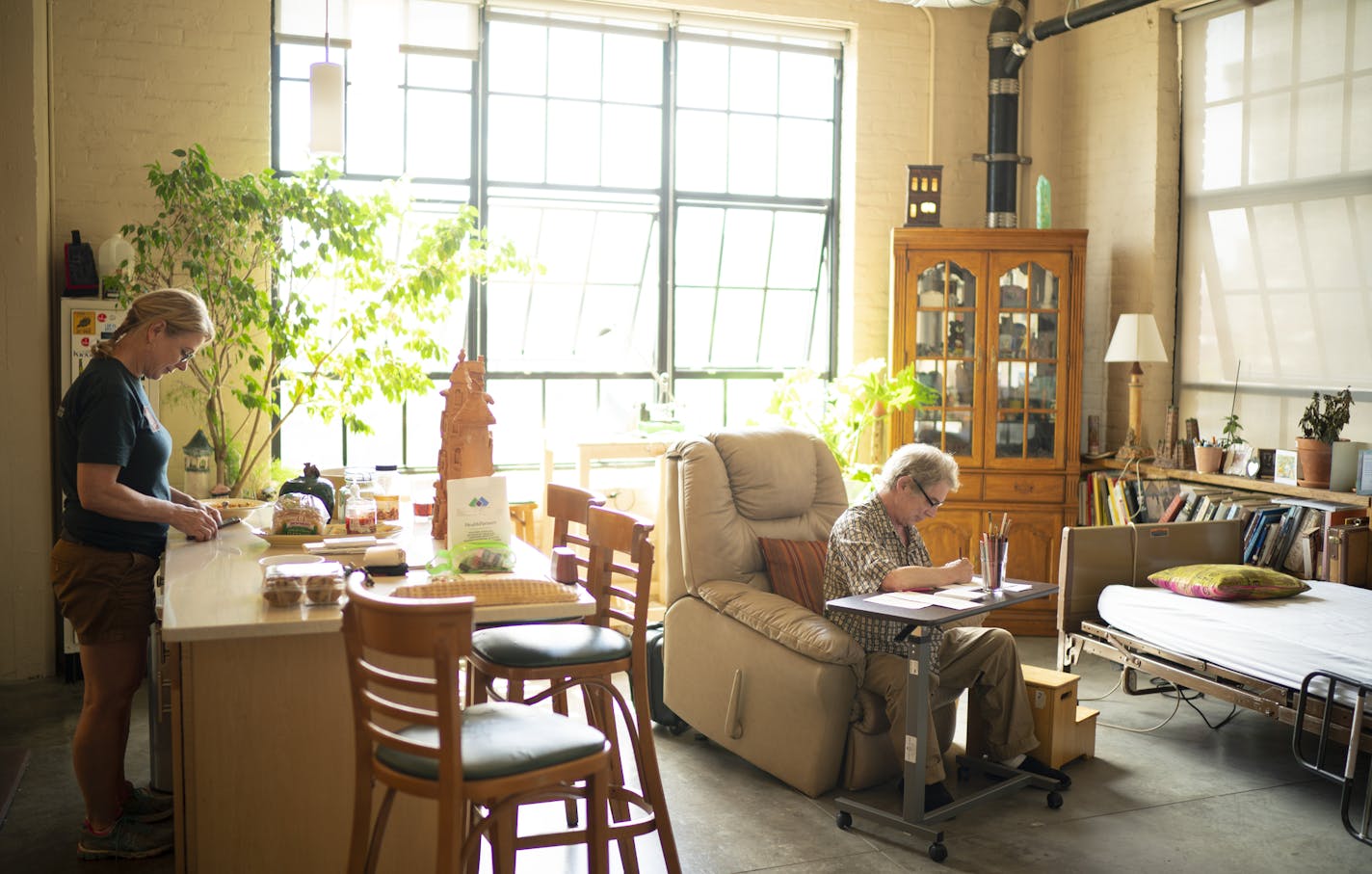 Aldo Moroni, temporarily housebound due to a blood clot in his leg, in addition to his cancer, sketches in his Minneapolis loft while his former wife, Kim Moroni, who is involved in his care, dropped by for a visit. ] JEFF WHEELER • jeff.wheeler@startribune.com Long-time Minneapolis artist Aldo Moroni is dying of pancreatic cancer, but still hard at work. An Italian-American from Chicago, Moroni is best known for his small-scale creations of built civilizations. He was photographed at his loft i