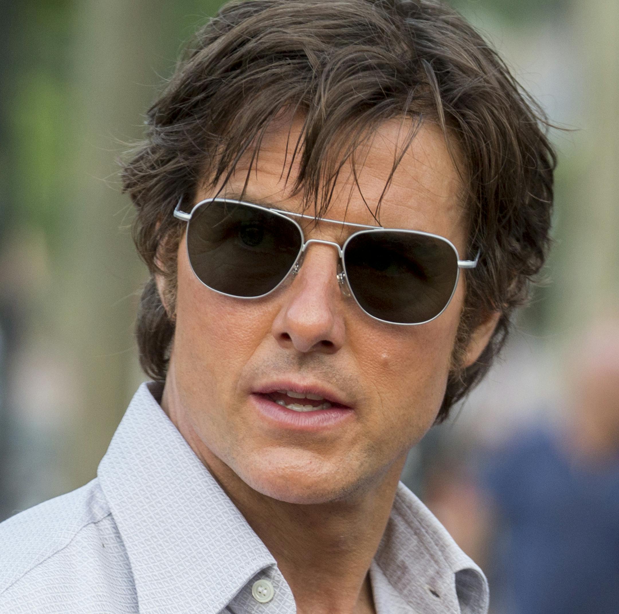 This image released by Universal Pictures shows Tom Cruise as Barry Seal in a scene from, "American Made." (David James/Universal Pictures via AP)