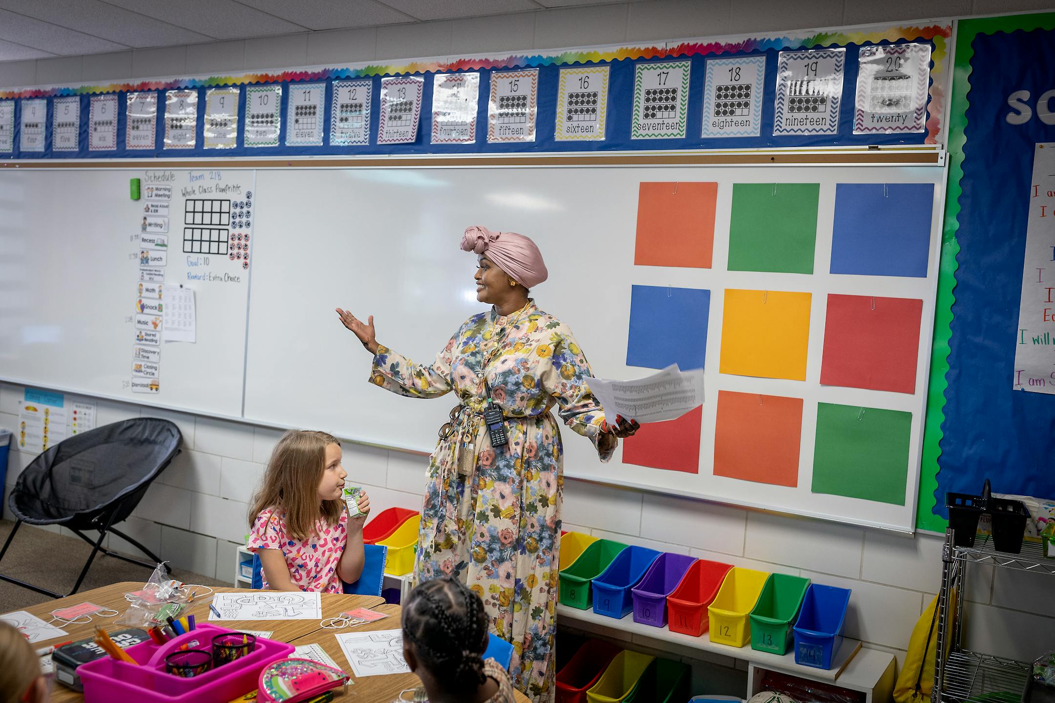 Gideon Pond Elementary Principal Salma Hussein, introduces herself as she visits each classroom in Burnsville.