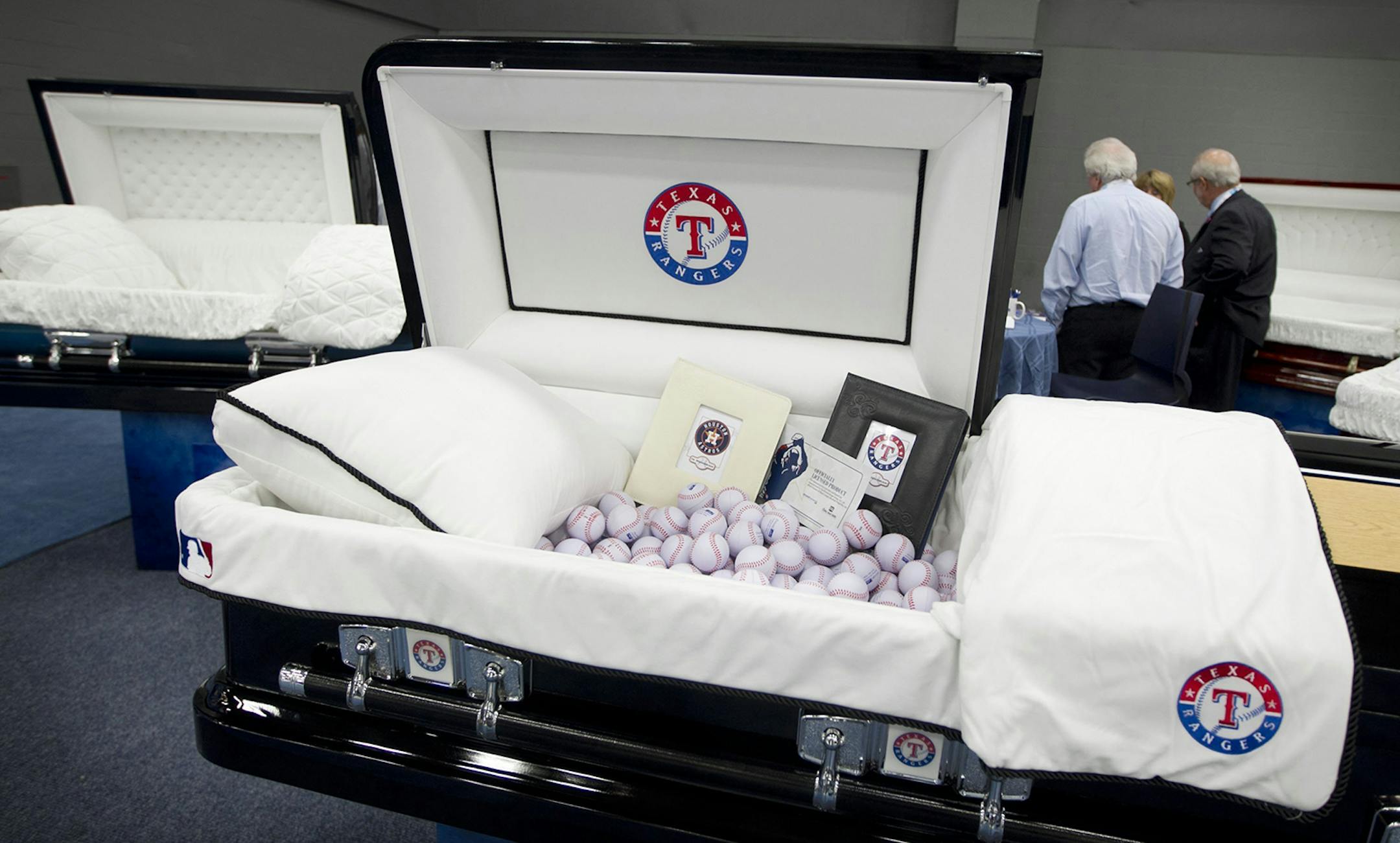 A casket with a Texas Rangers theme is displayed at the National Funeral Directors Association International Convention and Expo in Austin, Texas, on Oct. 22, 2013. (Jay Janner/Austin American-Statesman/MCT) ORG XMIT: 1144758