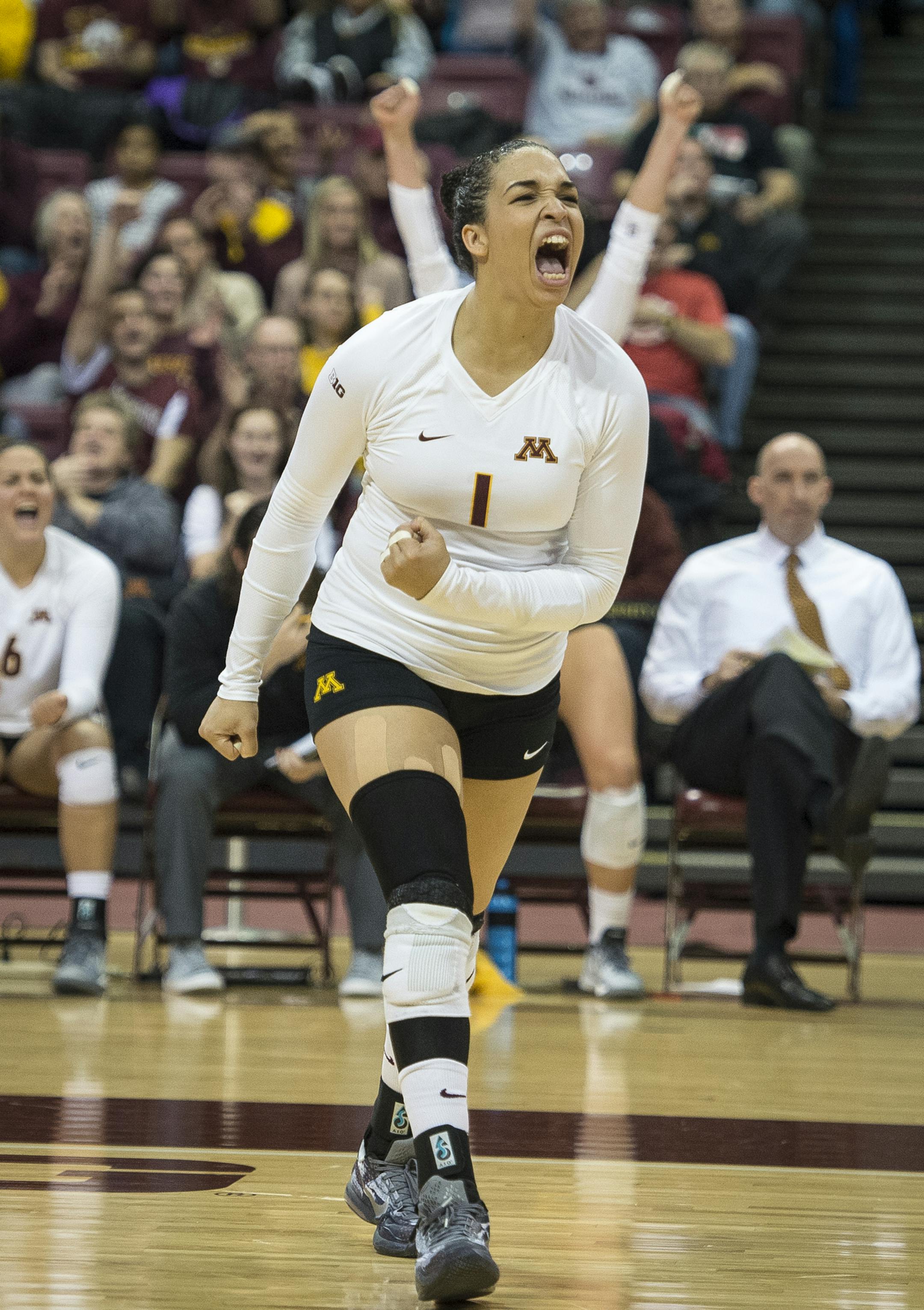 Minnesota outside hitter Daly Santana (1) celebrated after Minnesota scored a point against Marquette in the first set. ] (AARON LAVINSKY/STAR TRIBUNE) aaron.lavinsky@startribune.com The University of Minnesota Golden Gophers women’s volleyball team played Marquette in the second round of the NCAA tournament on Saturday, Dec. 5, 2015 at the University of Minnesota Sports Pavilion in Minneapolis, Minn.