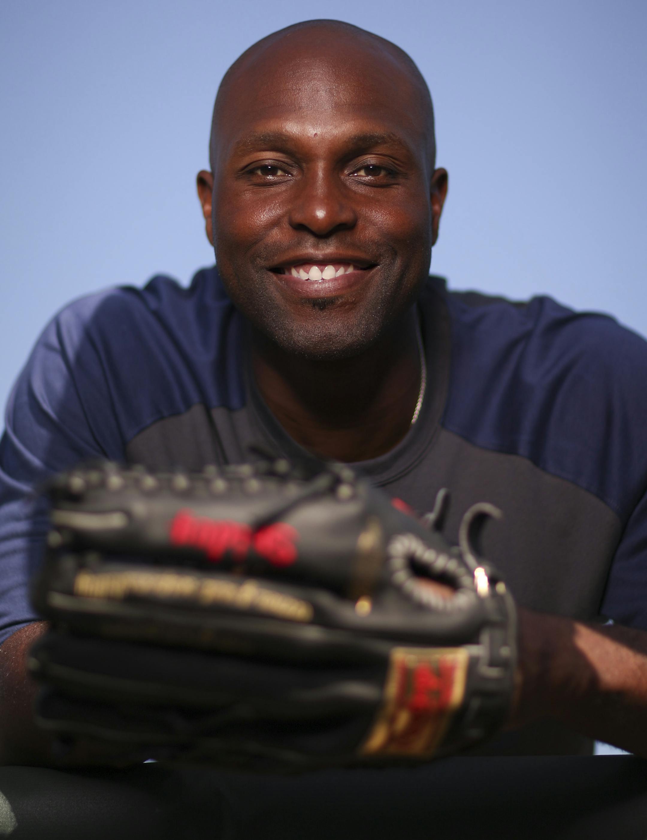 Twins outfielder Torii Hunter with his glove before the Grapefruit League season opener at Hammond Stadium. ] JEFF WHEELER ï jeff.wheeler@startribune.com The Twins opened their Grapefruit League season against the Boston Red Sox Thursday night, March 5, 2015, at Hammond Stadium in Fort Myers, FL.