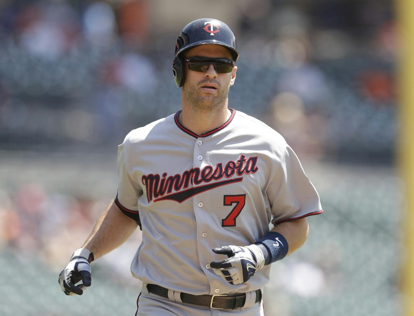 Minnesota Twins' Joe Mauer heads home after his solo home run during the first inning of a baseball game against the Detroit Tigers, Wednesday, July 20, 2016 in Detroit. (AP Photo/Carlos Osorio)