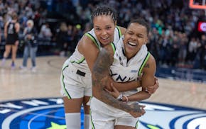 Lynx forward Napheesa Collier celebrates with Lynx guard Courtney Williams after they defeated the Connecticut Sun with a come-from-behind 76-70 win a